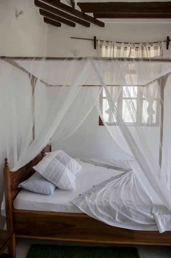 Bed in Shamba Lodge
