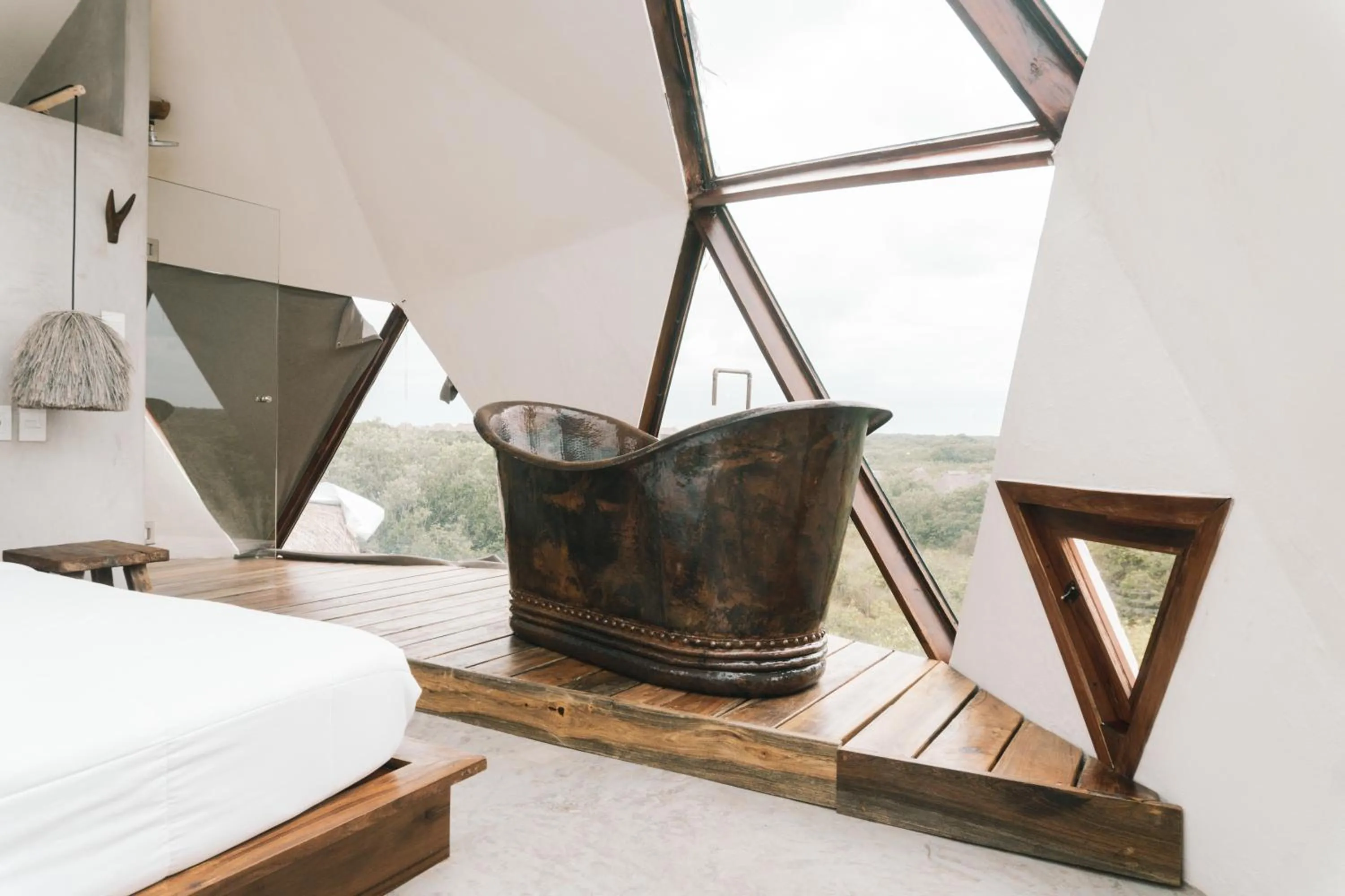 Bath, Bed in Mamasan Treehouses & Cabins