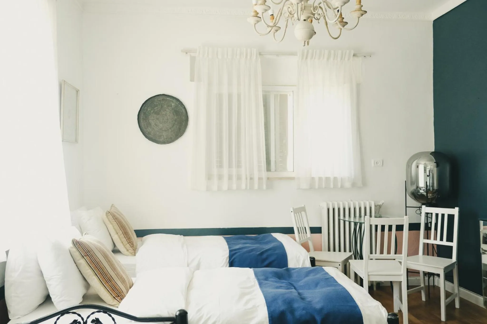 Seating area, Bed in Tzefania Hotel