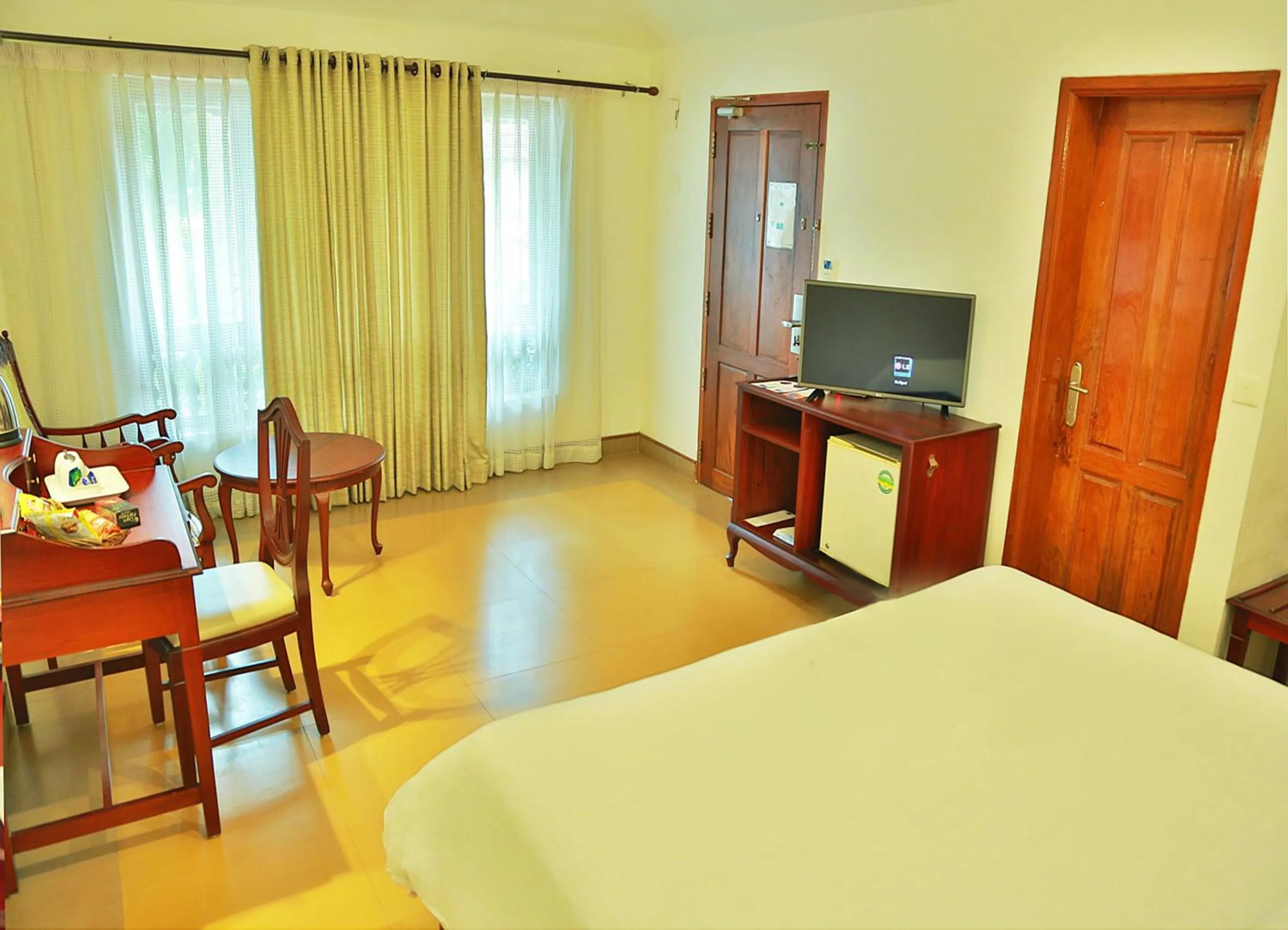 Photo of the whole room, Bed in Estuary Sarovar Premiere Poovar Island