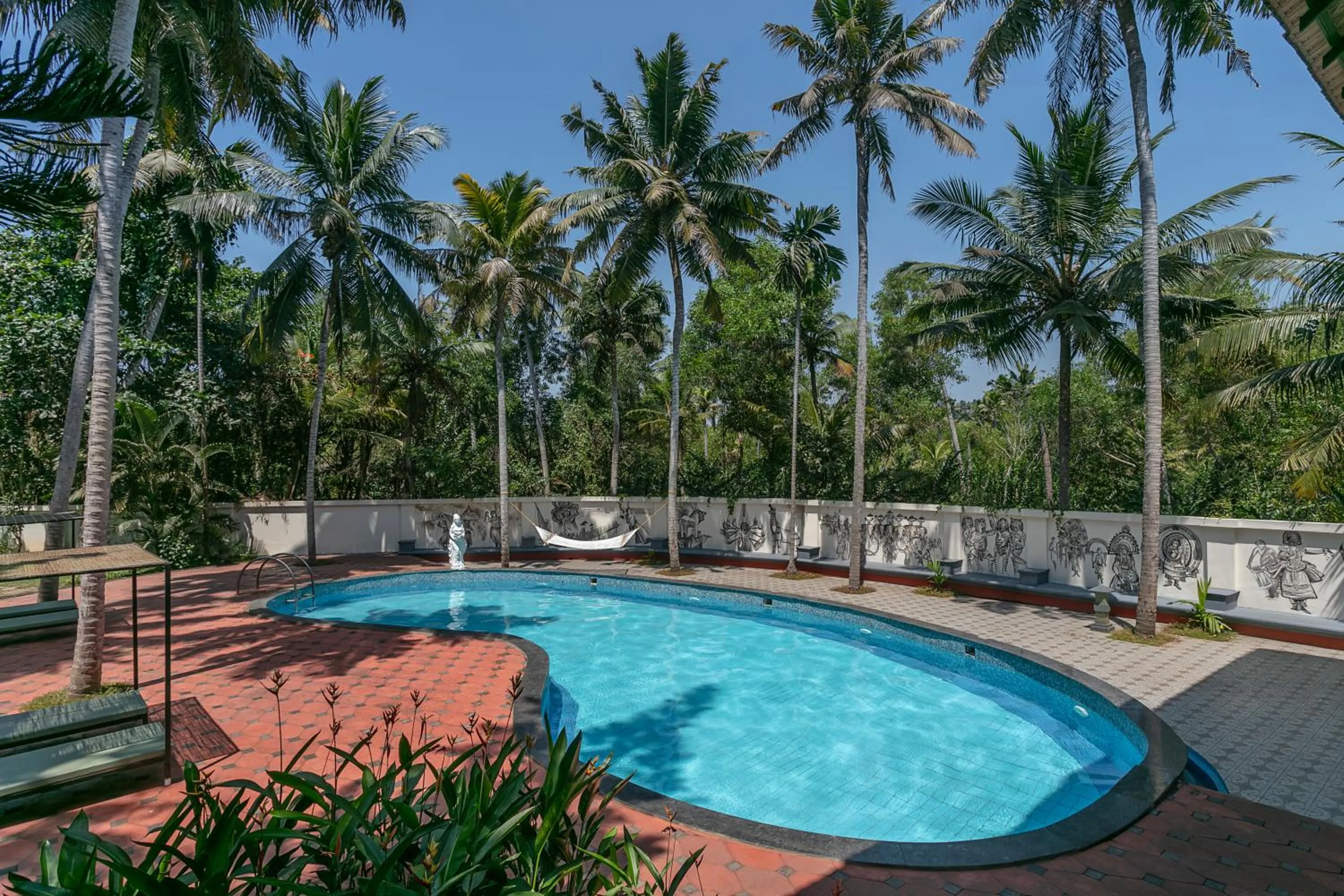 Swimming pool in Estuary Sarovar Premiere Poovar Island