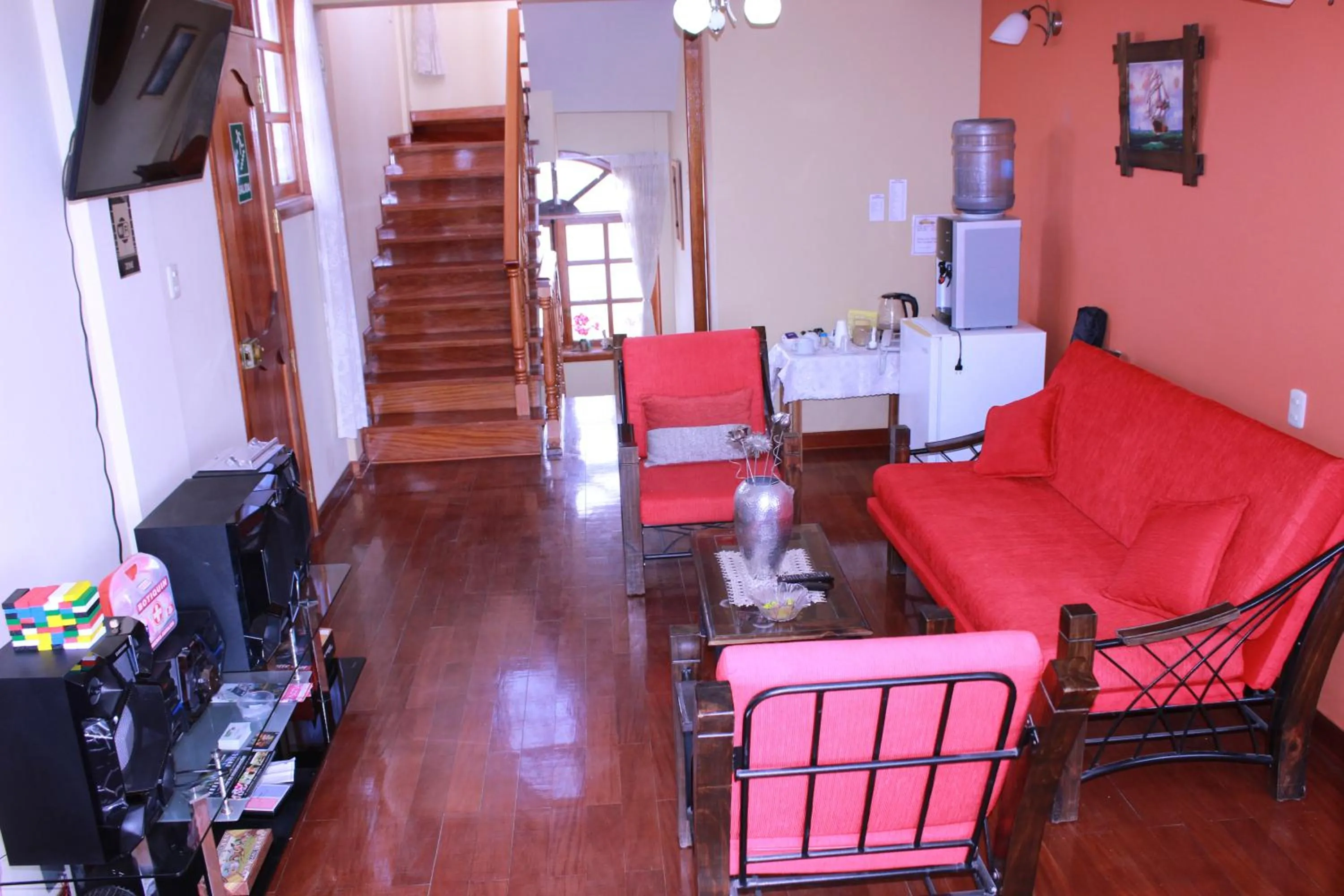 Communal lounge/ TV room in The House