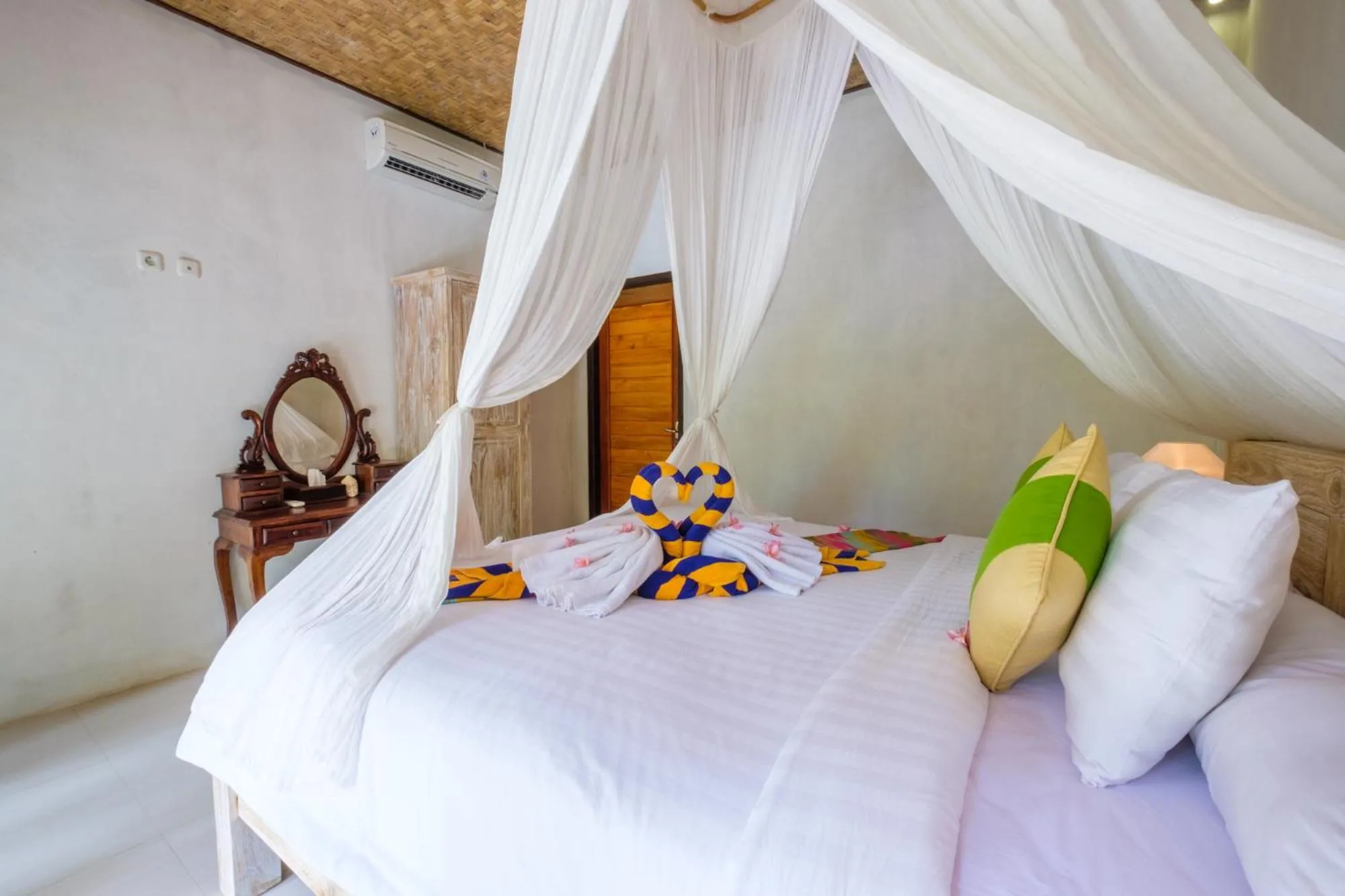 Bed in Crystal Bay Bungalows