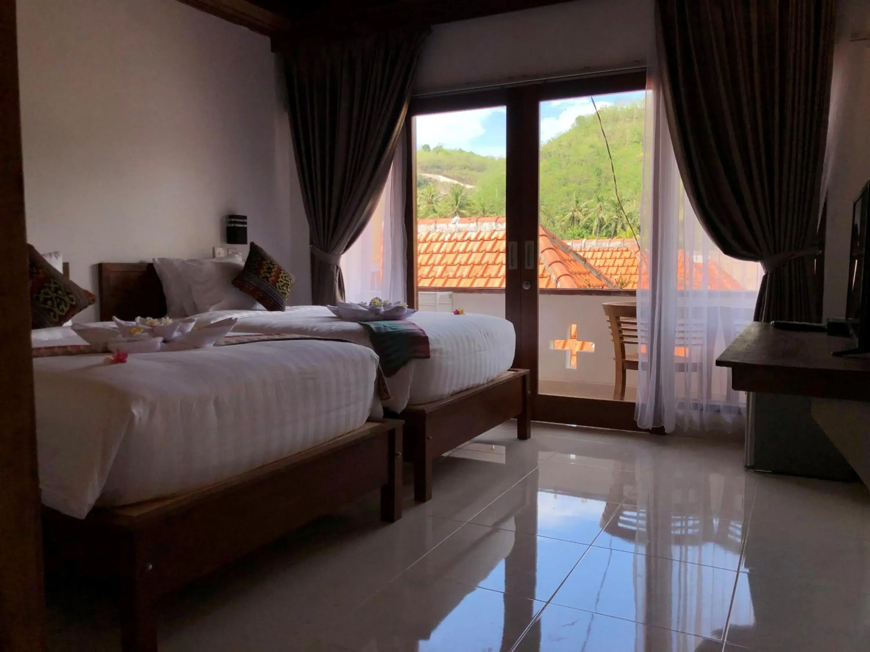 Bed in Crystal Bay Bungalows Bed in Crystal Bay Bungalows