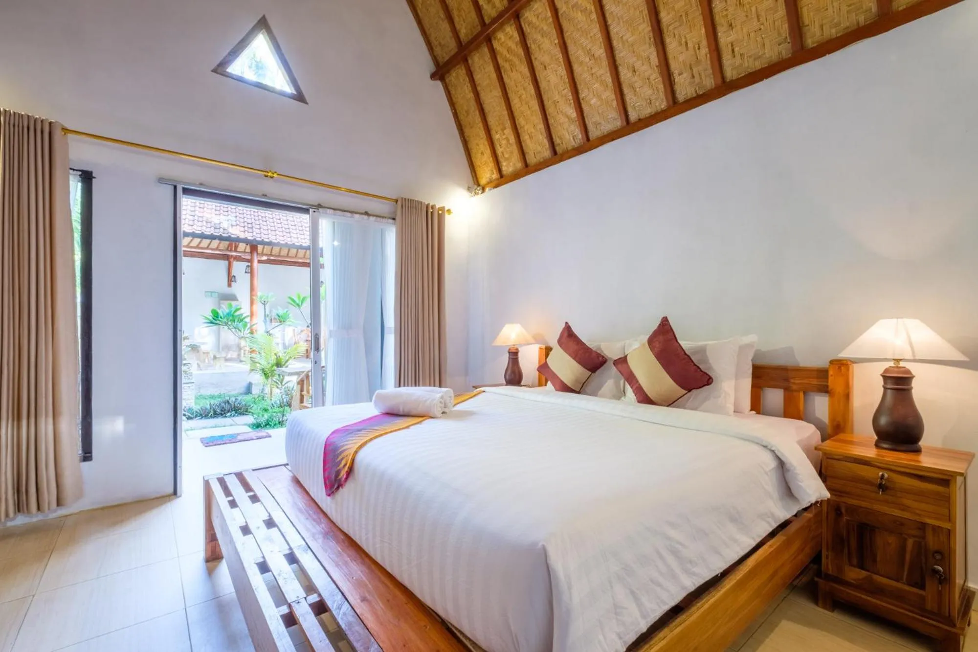 Bed in Crystal Bay Bungalows