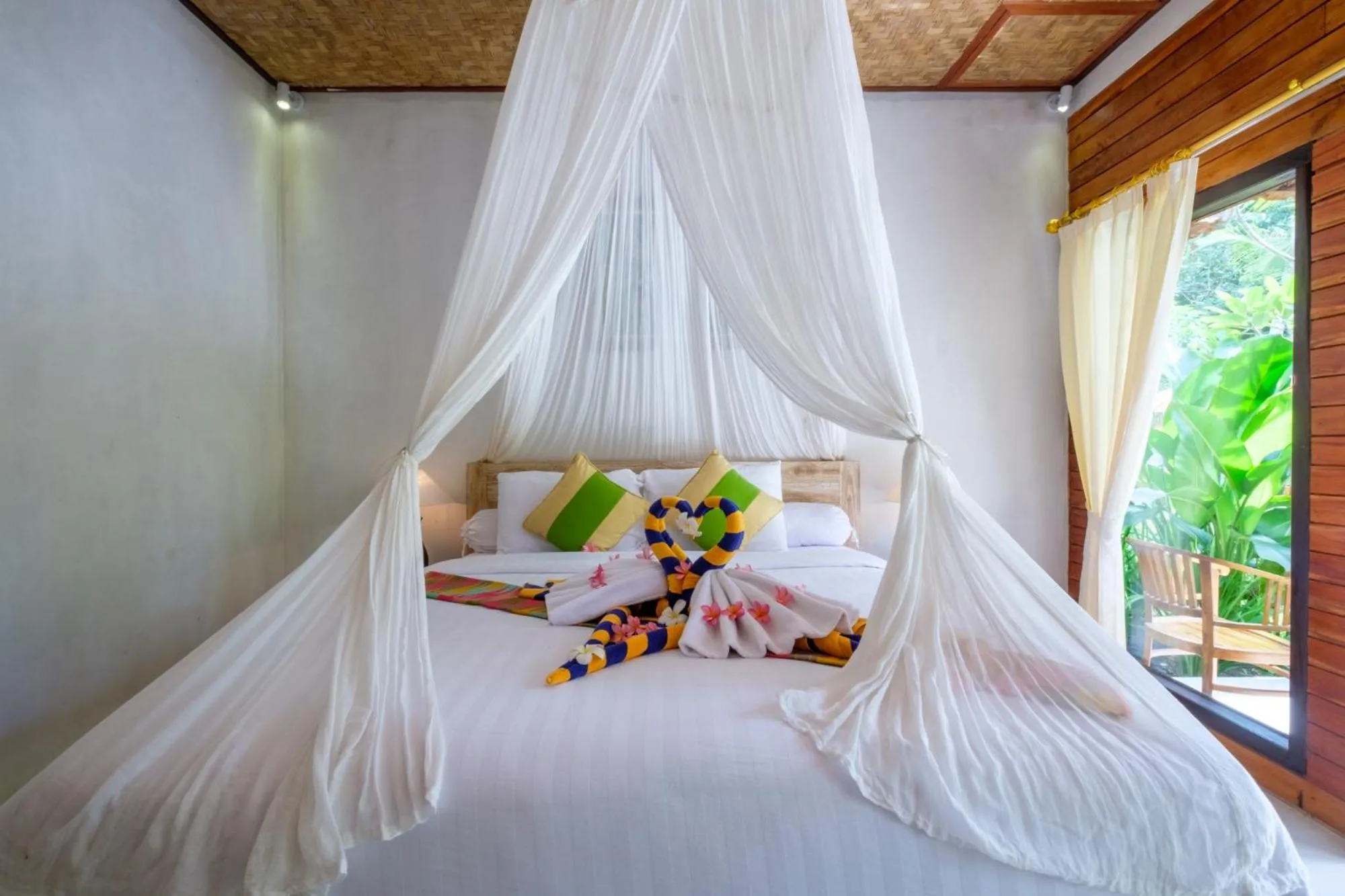 Bed in Crystal Bay Bungalows