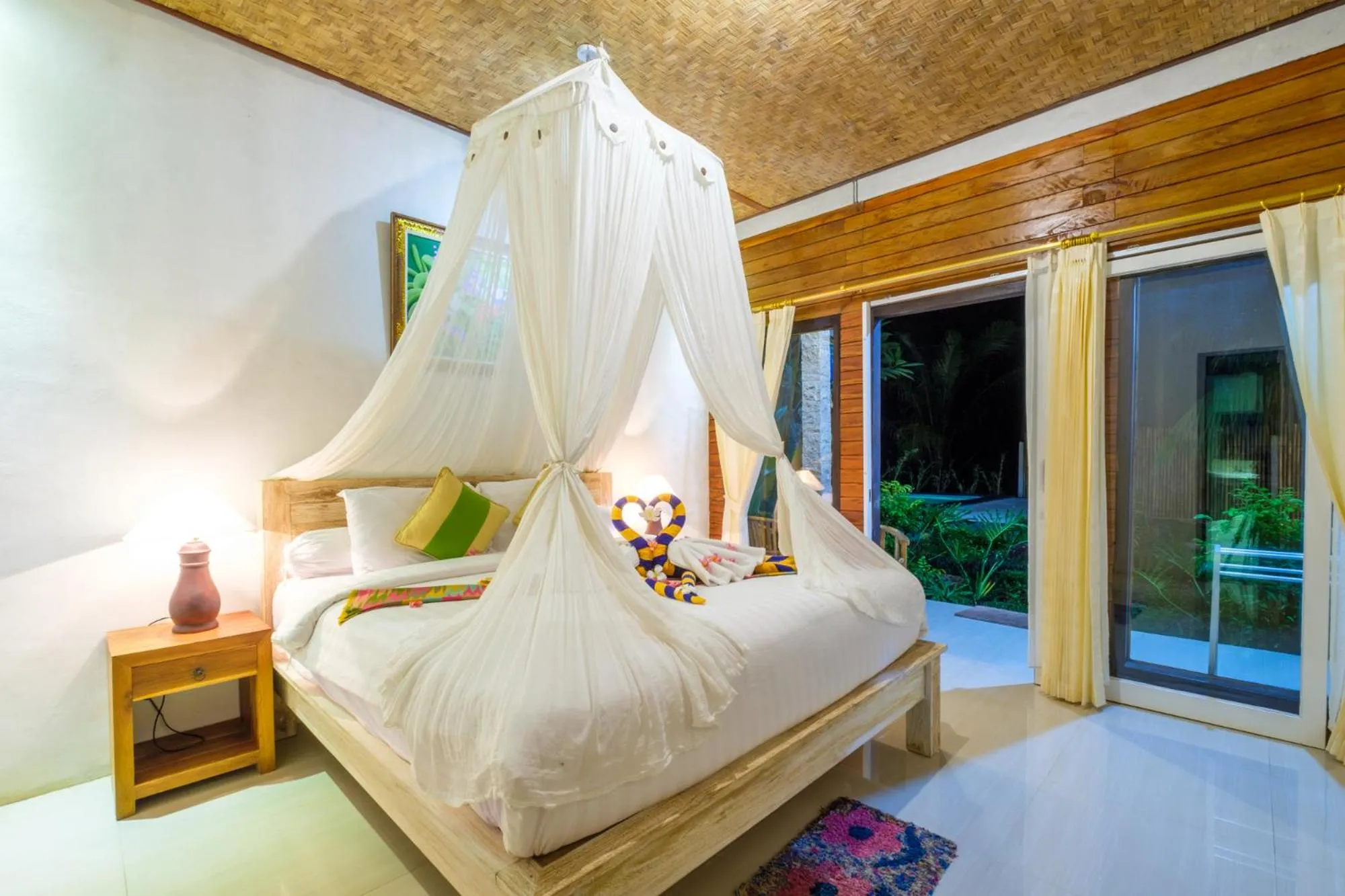 Bed in Crystal Bay Bungalows