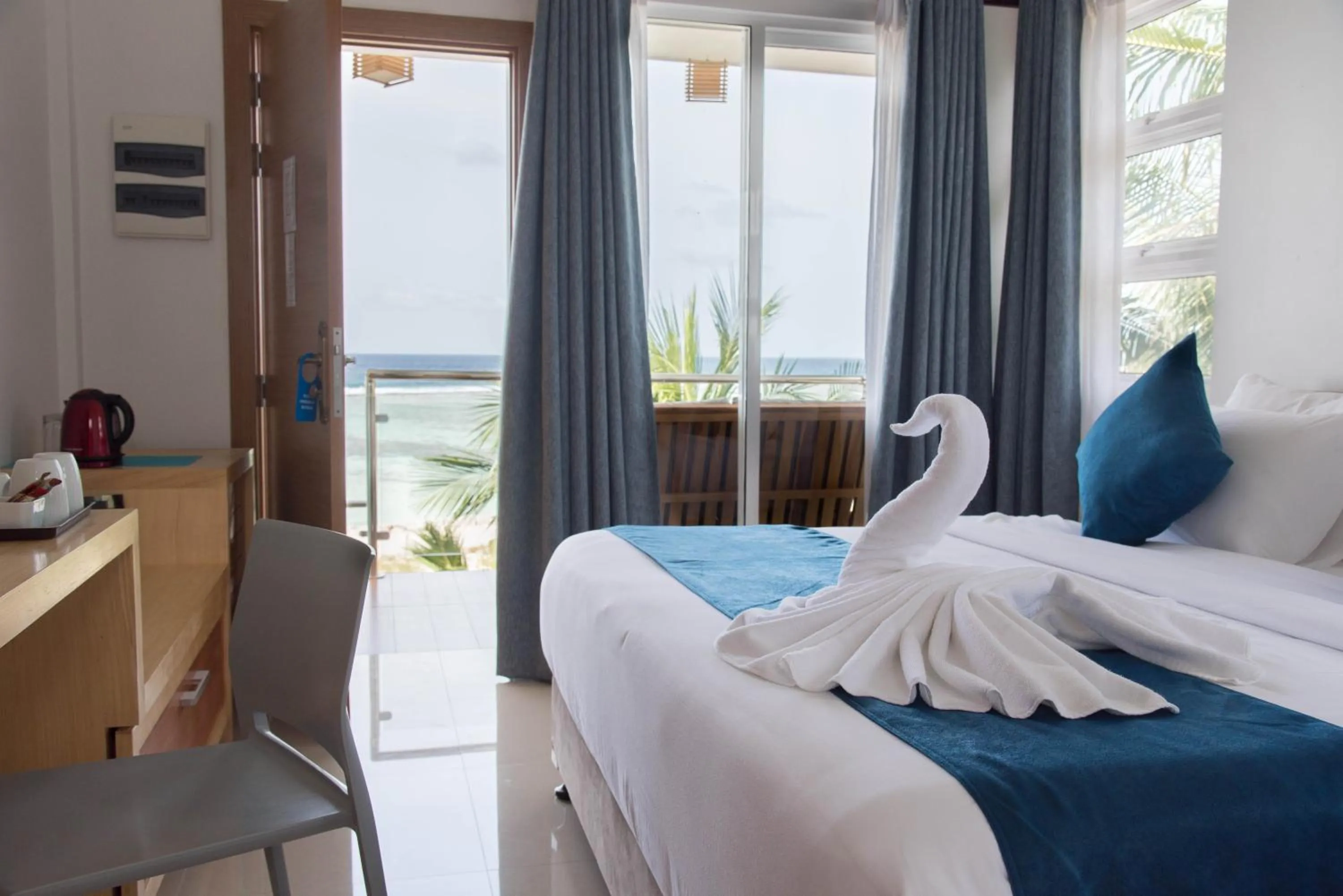 Bed in Reef Edge Thulusdhoo, Maldives