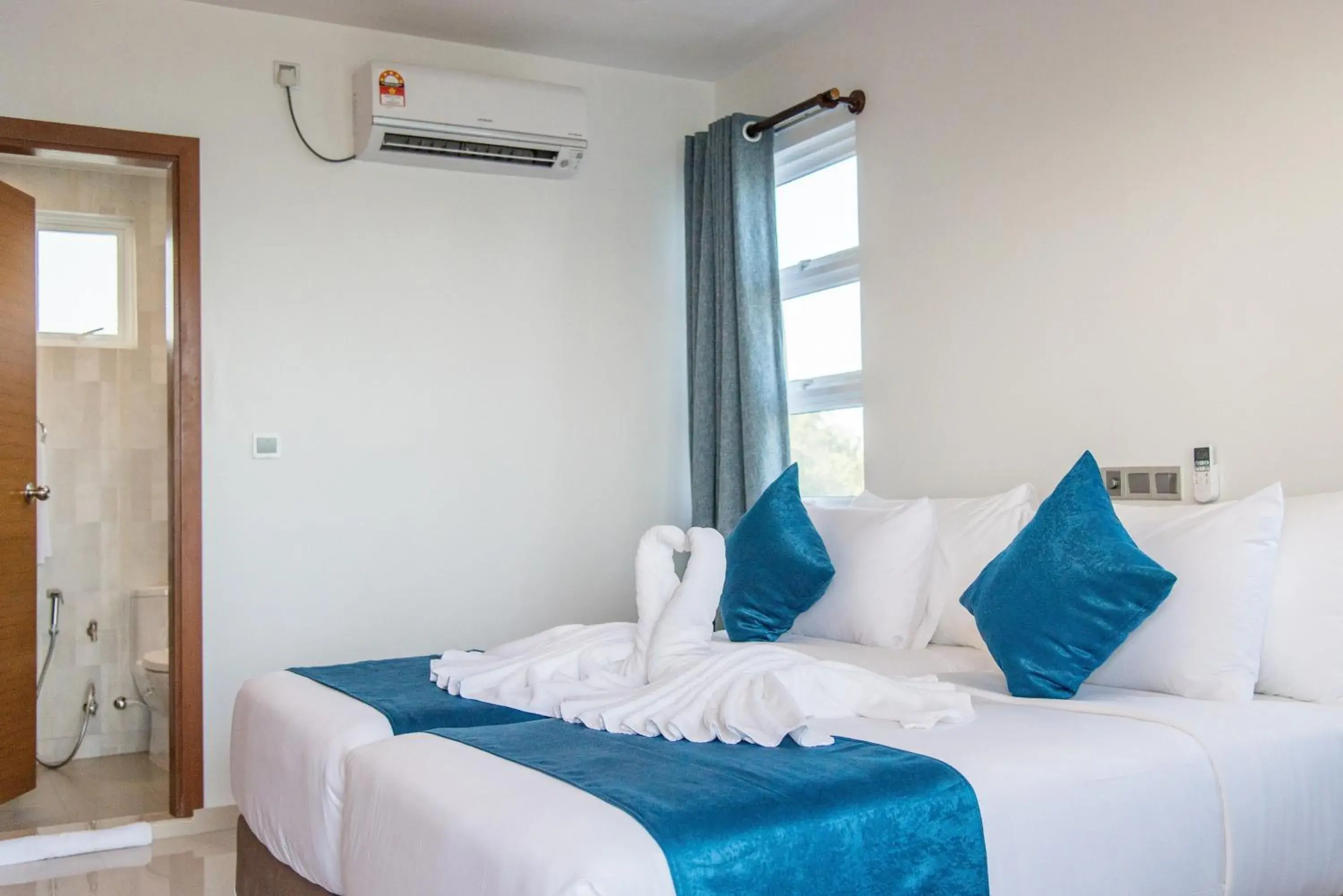 Bed in Reef Edge Thulusdhoo, Maldives Bed in Reef Edge Thulusdhoo, Maldives