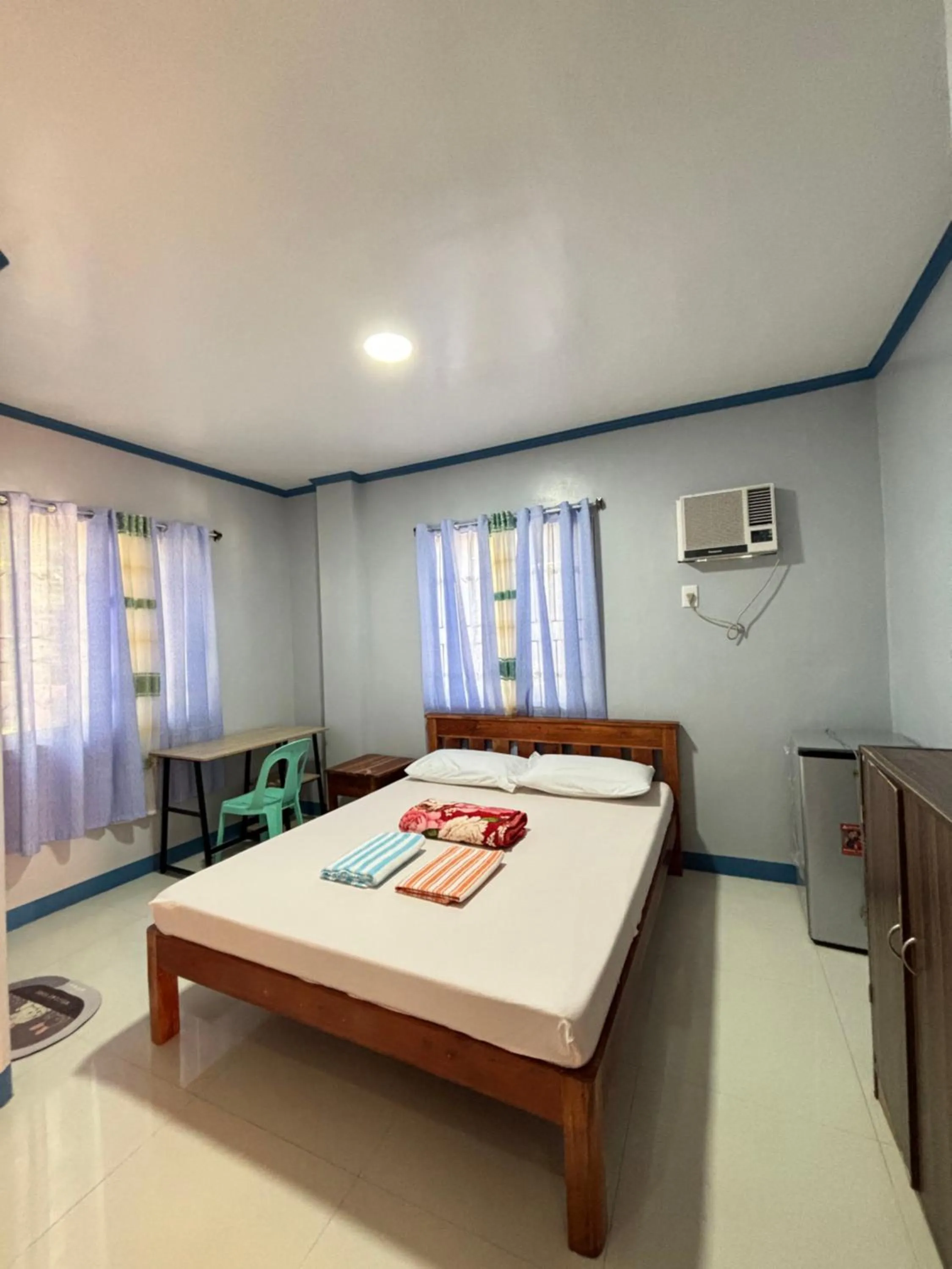 Bed in La Fela Pension House