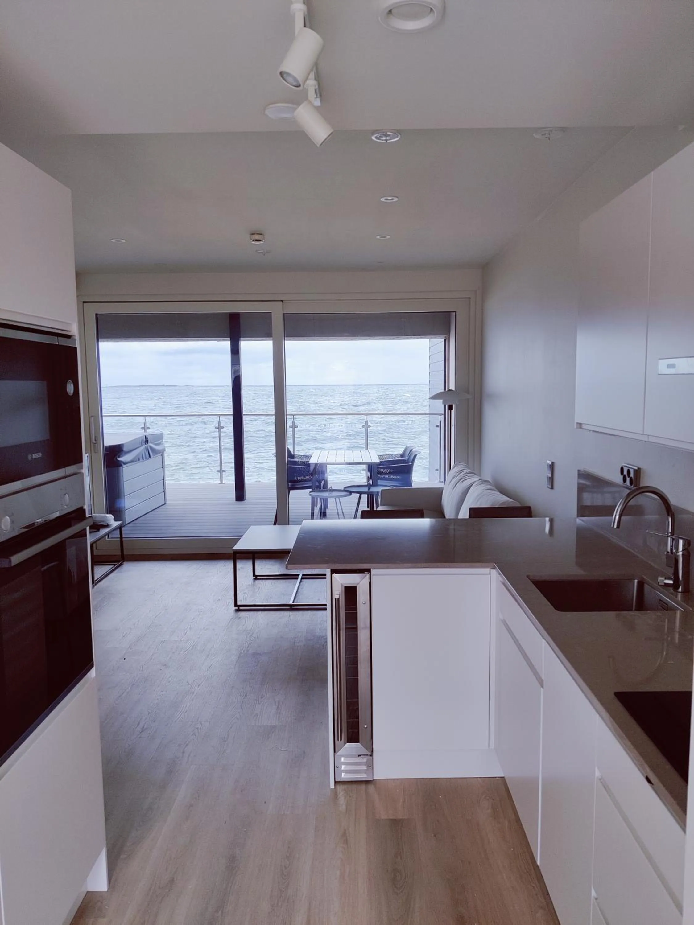 Kitchen or kitchenette, Bed in HavsVidden Resort