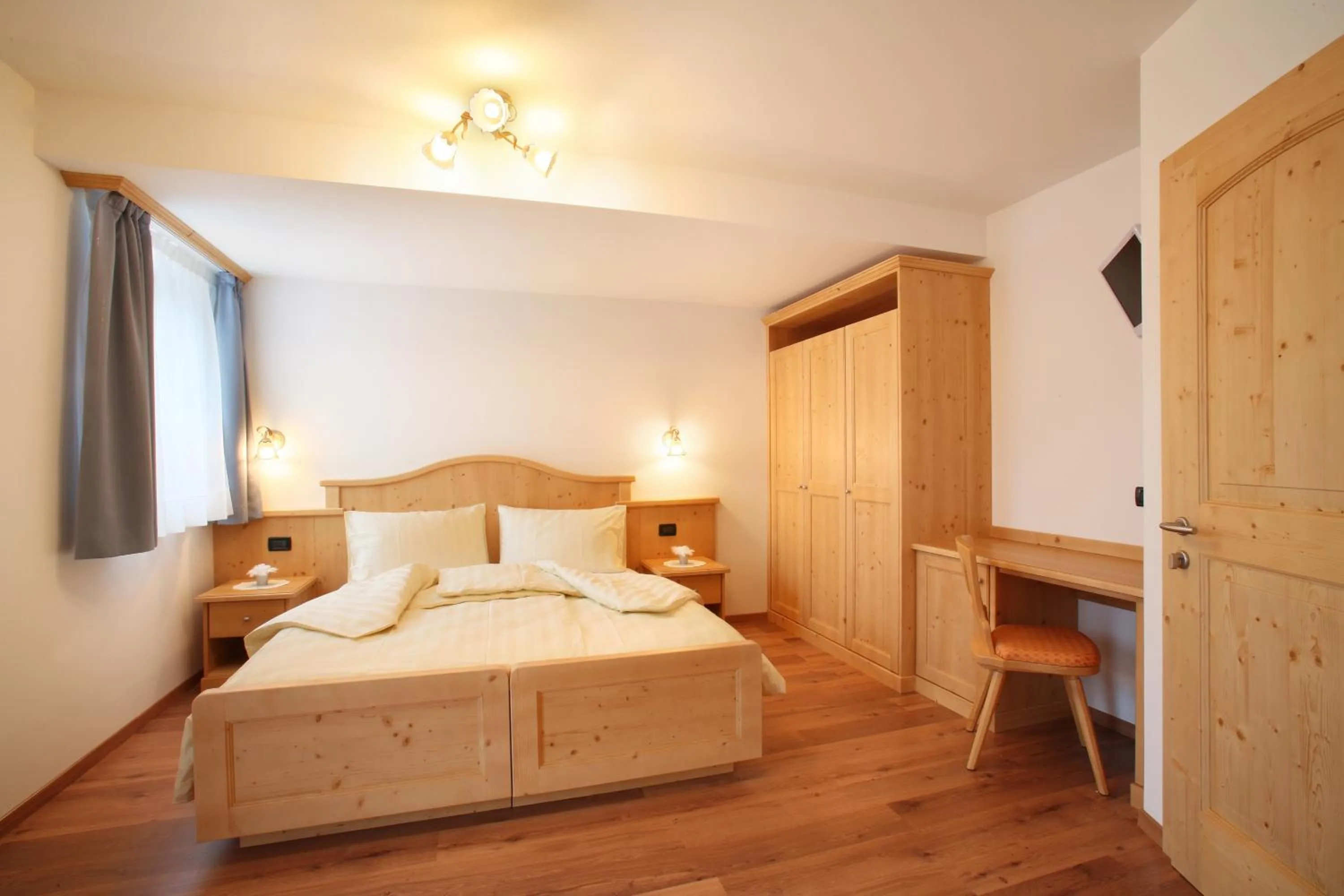 Photo of the whole room, Bed in Garnì Prà Fiorì