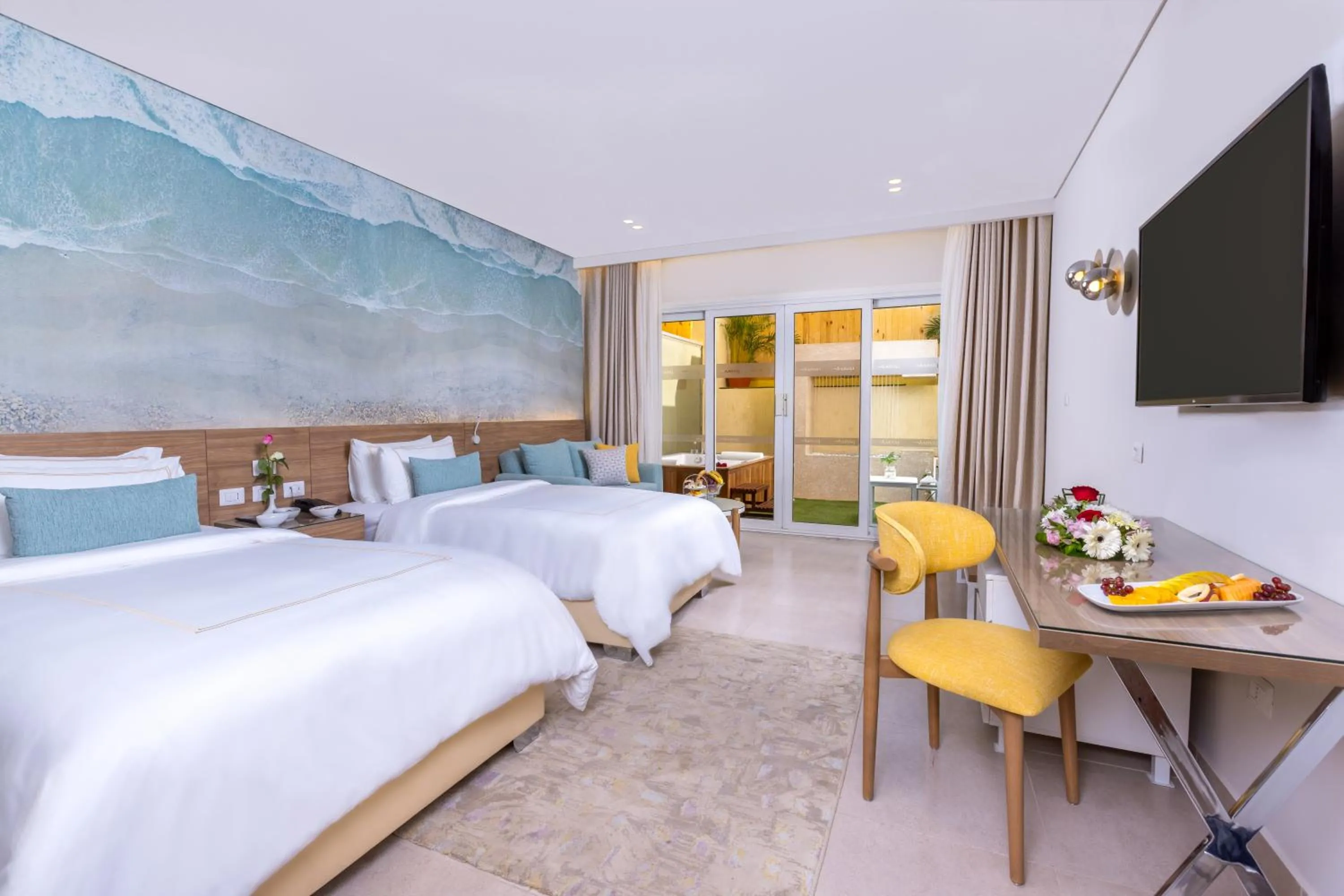 Bed in Amwaj Oyoun Resort