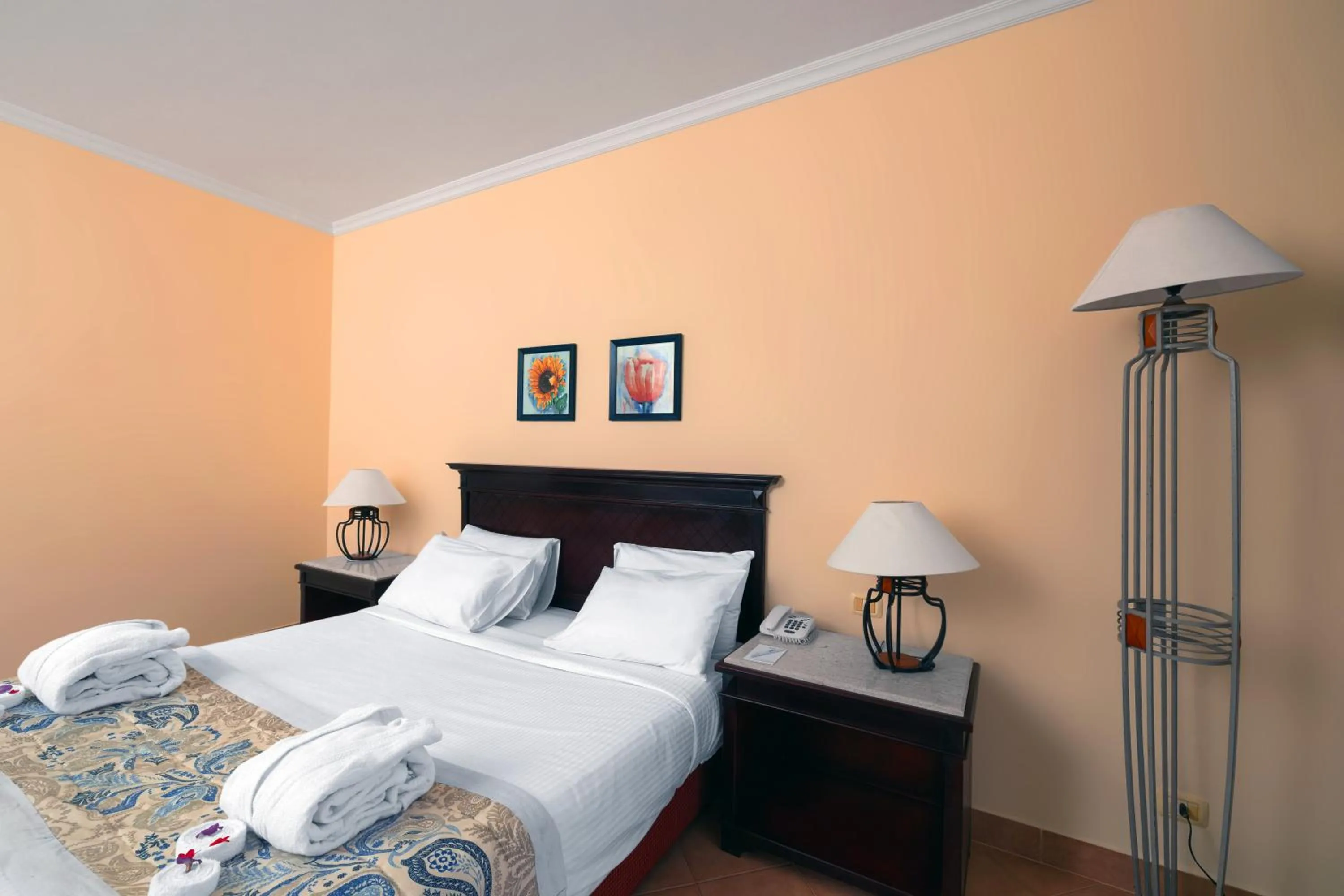 Bed in Amwaj Oyoun Resort