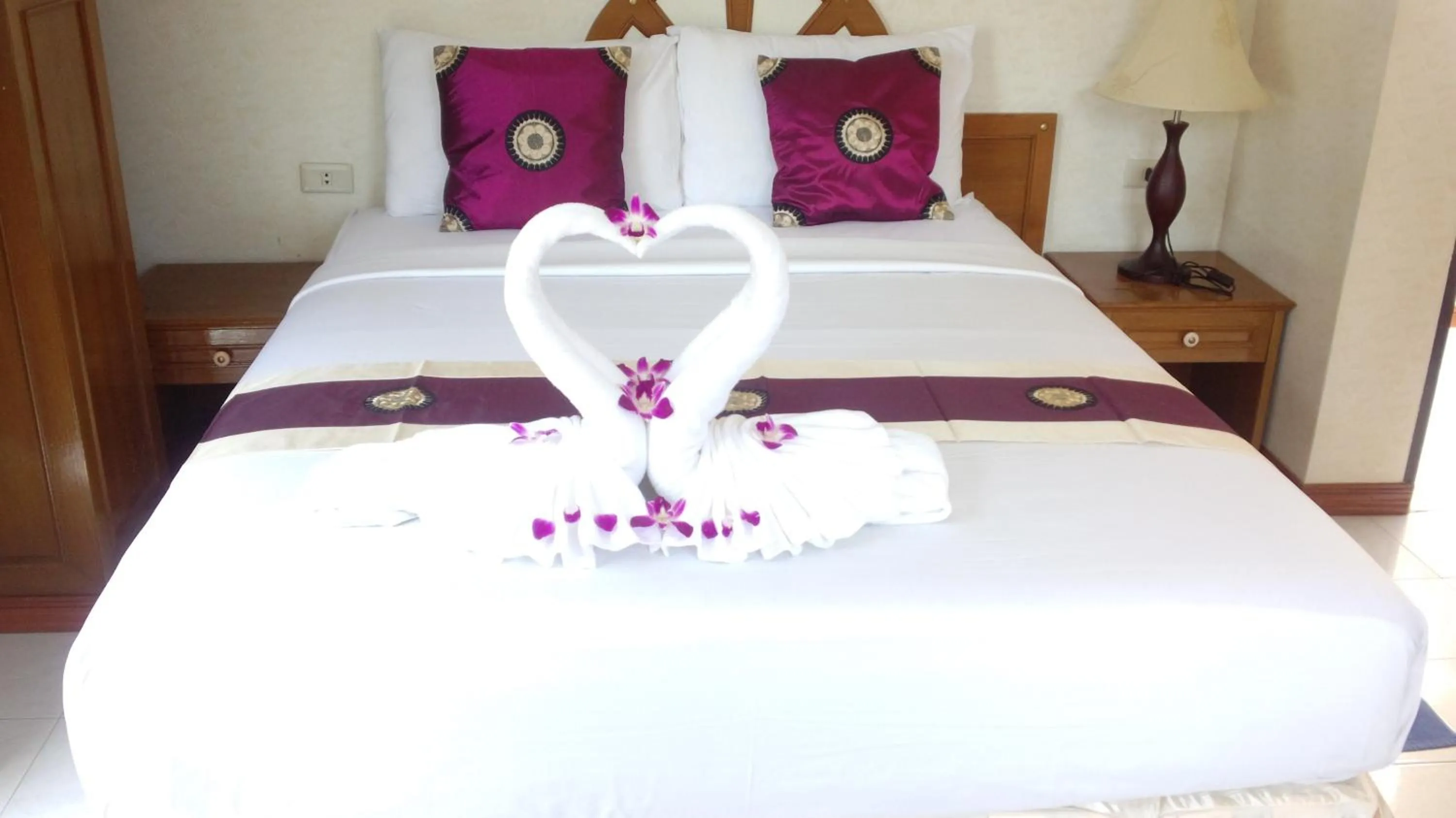 Bed in Natacha Hotel