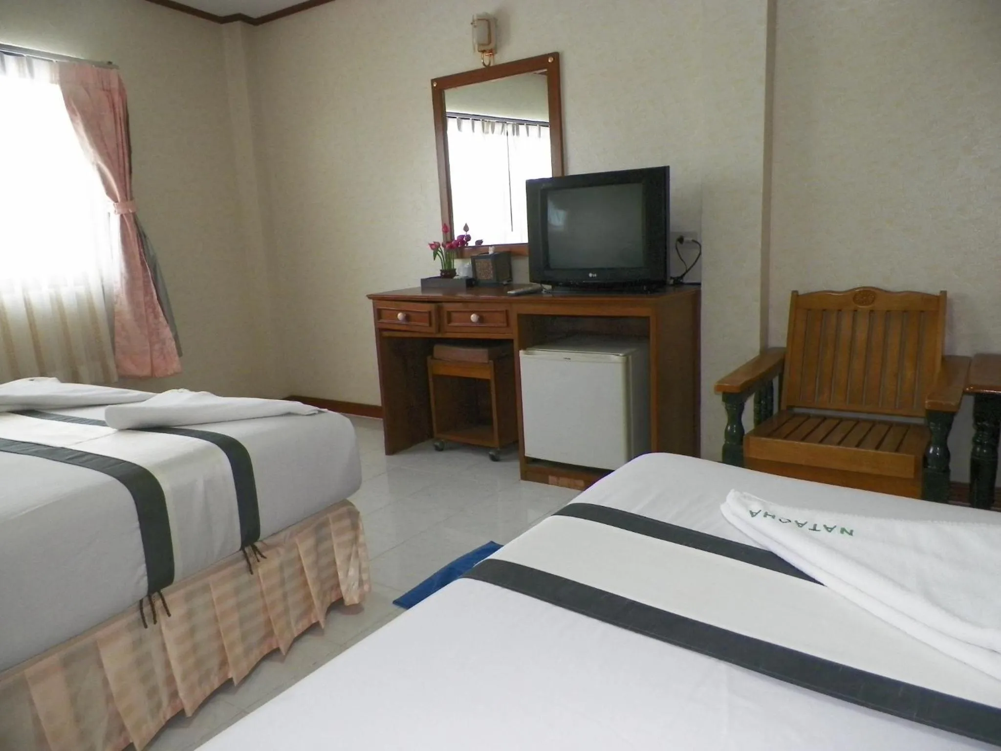Bed in Natacha Hotel
