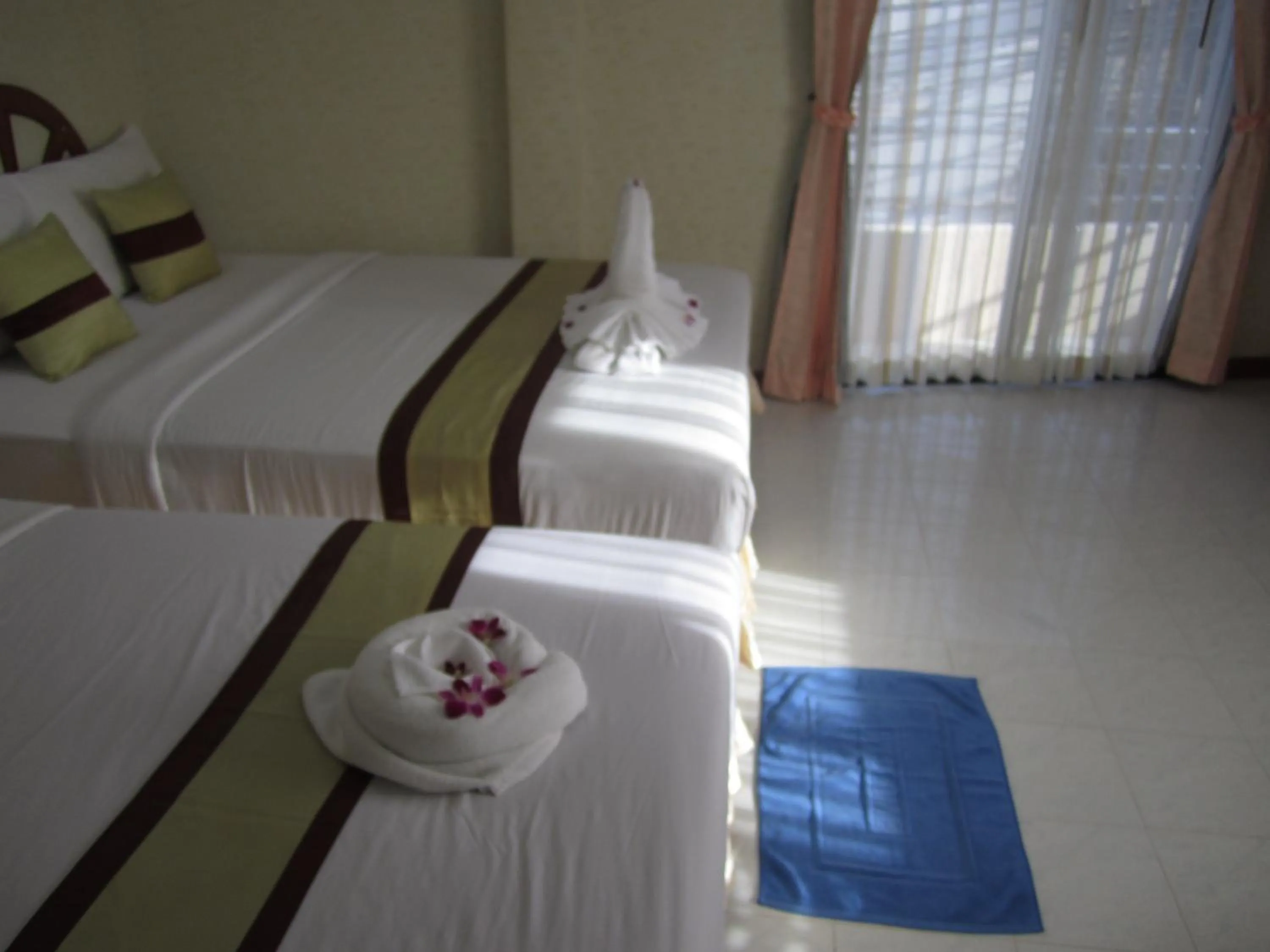Bed in Natacha Hotel