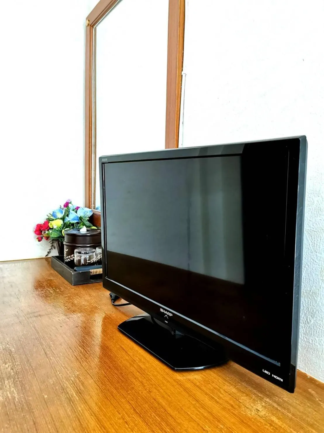 Communal lounge/ TV room in Natacha Hotel
