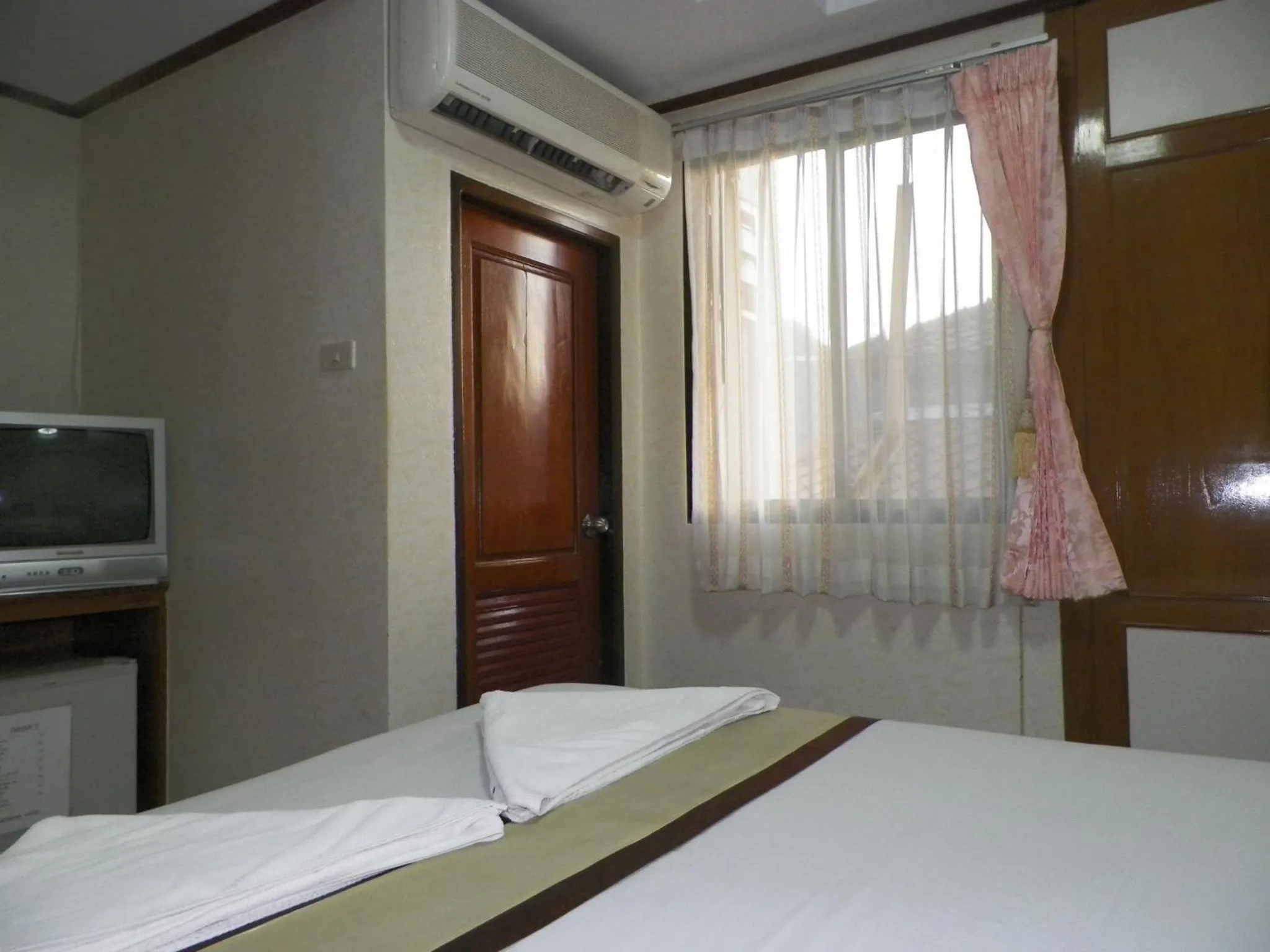 Bed in Natacha Hotel