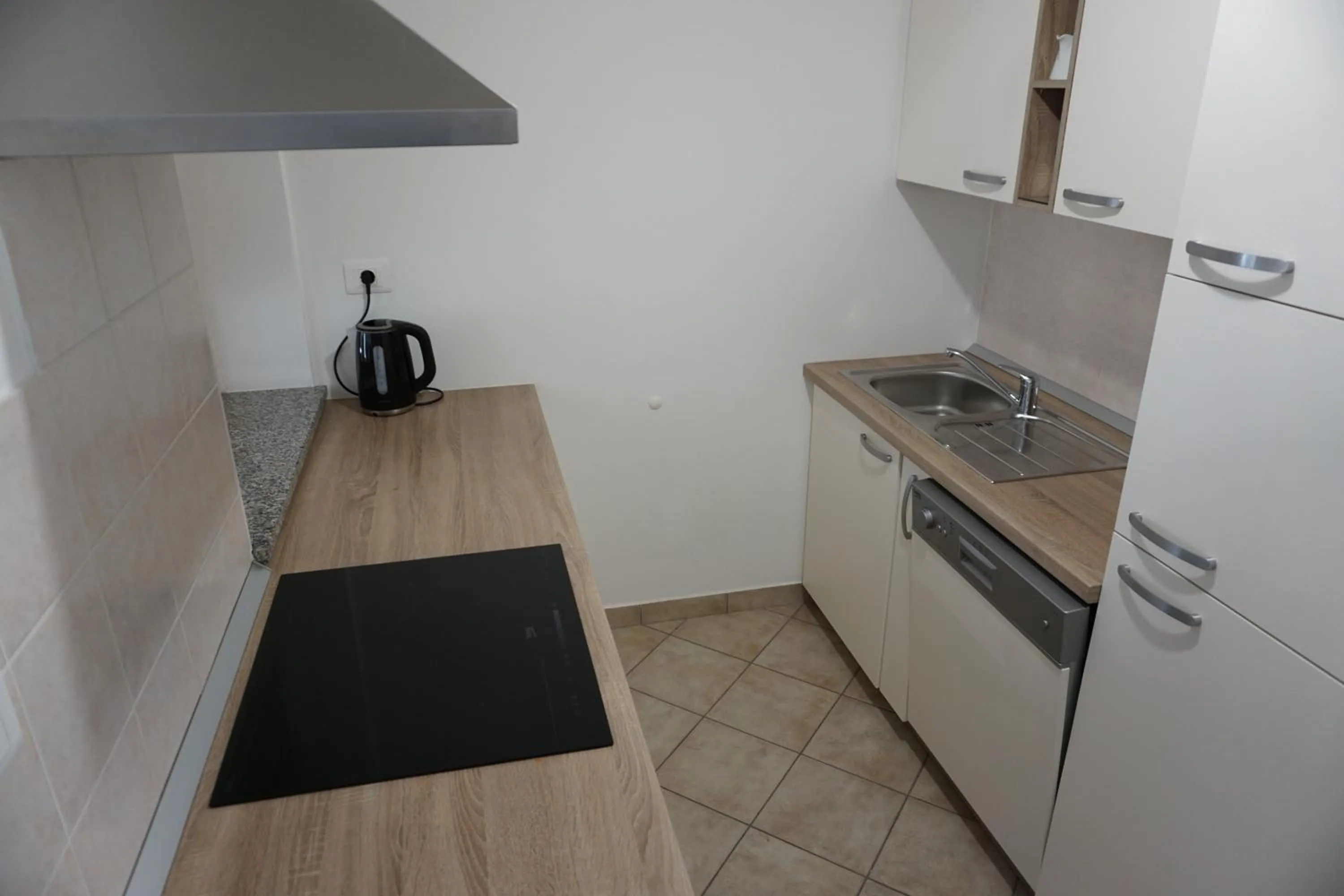 Kitchen or kitchenette in ALPIN apartma