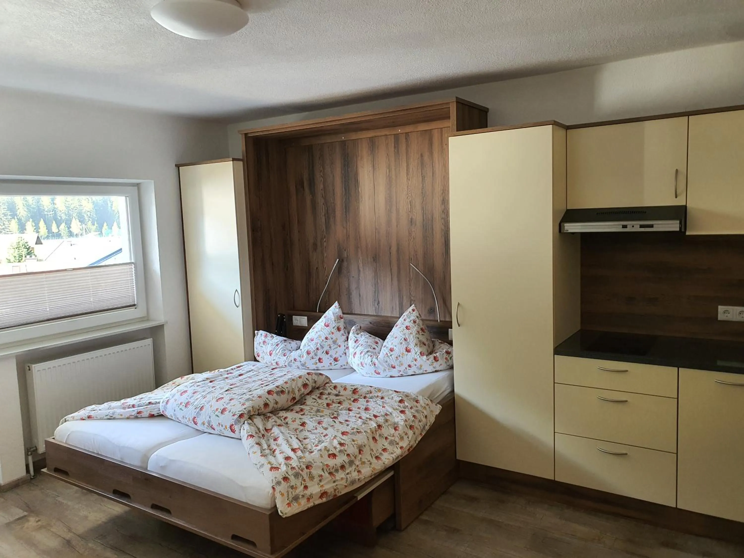 Communal lounge/ TV room, Bed in Apart Felsenhof