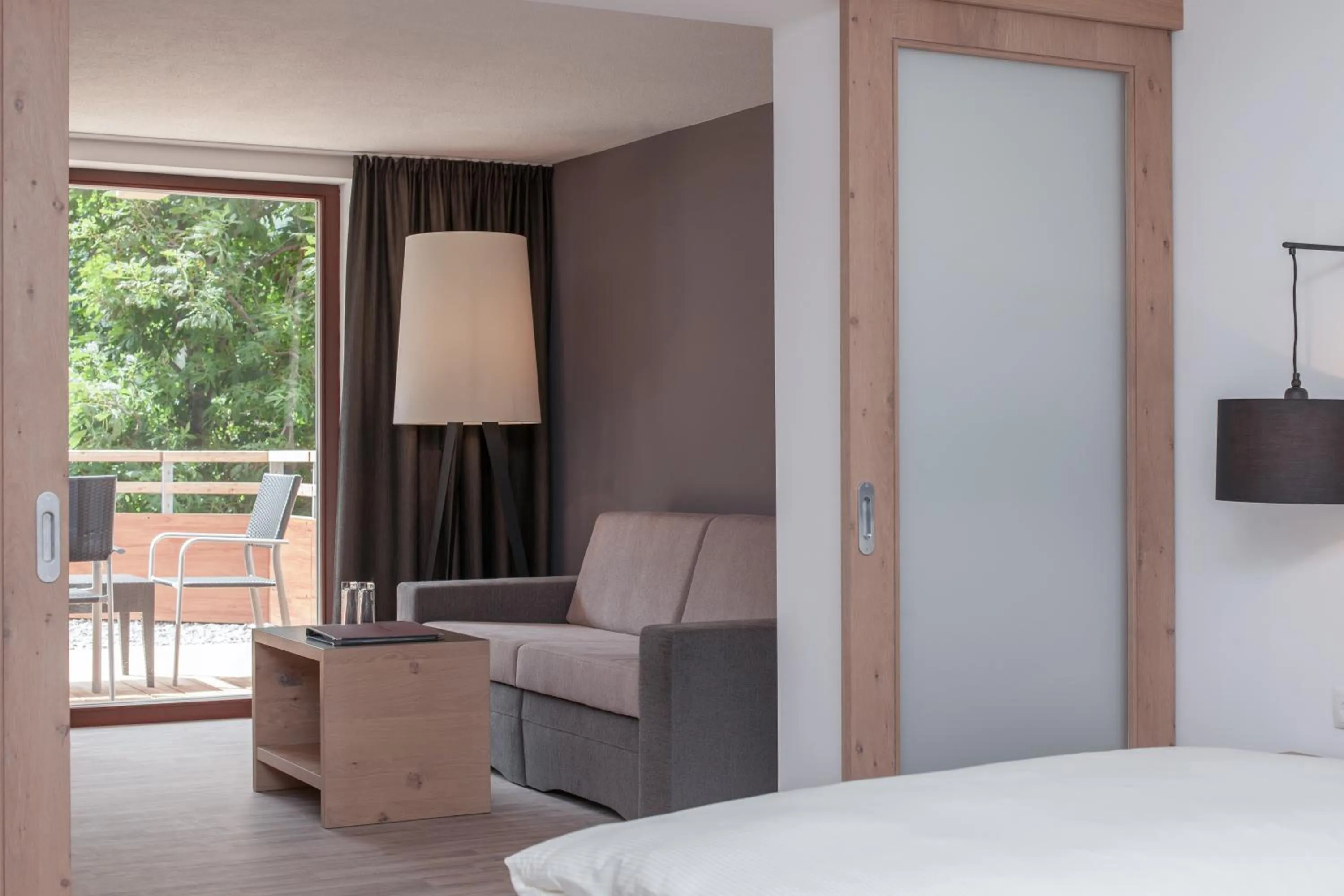 Living room, Bed in Hotel Bergwelt