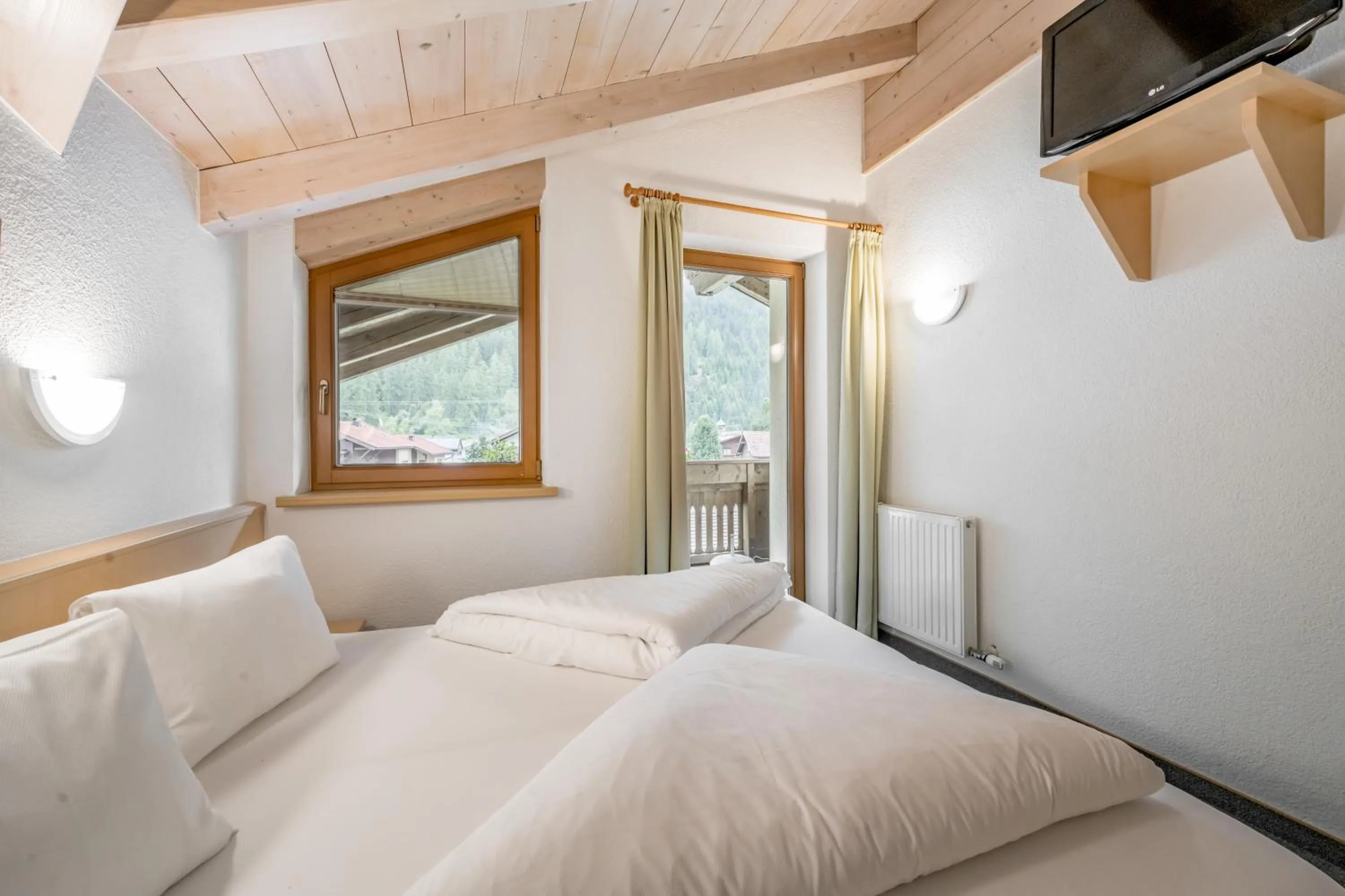 Bedroom, Bed in Hotel Bergwelt