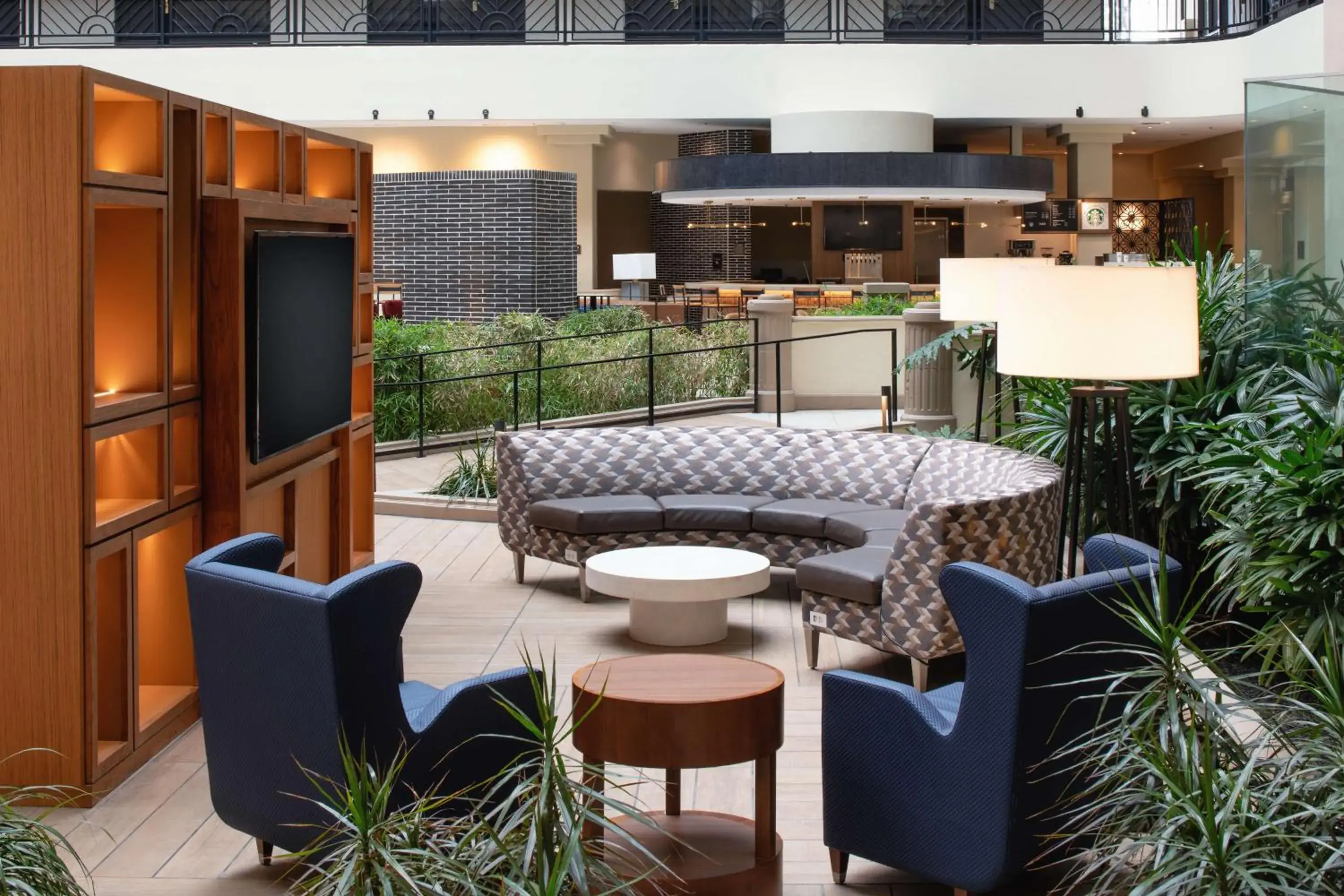 Lobby or reception in Embassy Suites by Hilton San Francisco Airport Oyster Point Lobby or reception in Embassy Suites by Hilton San Francisco Airport Oyster Point