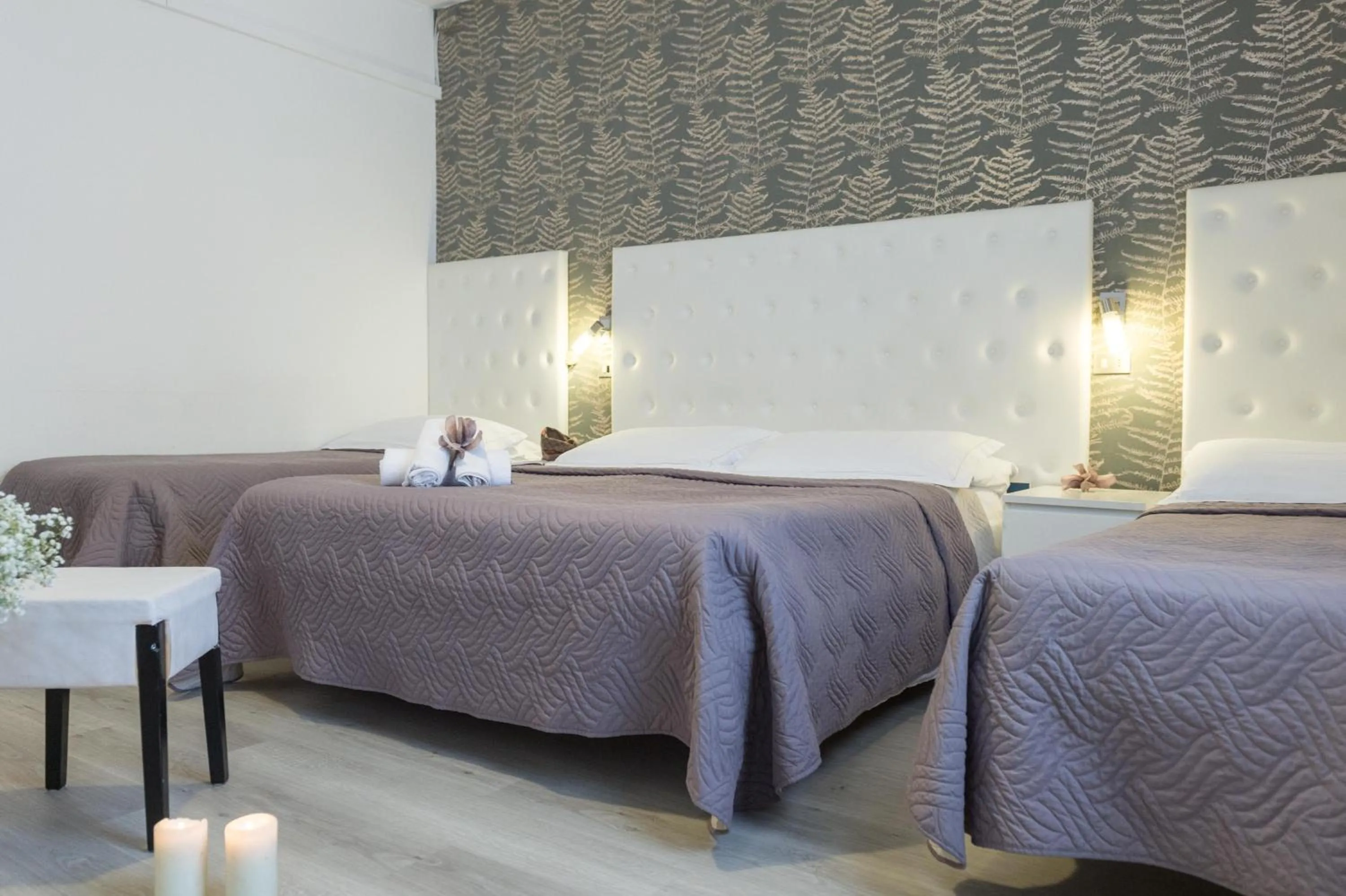 Bed in Hotel La Perla Rimini