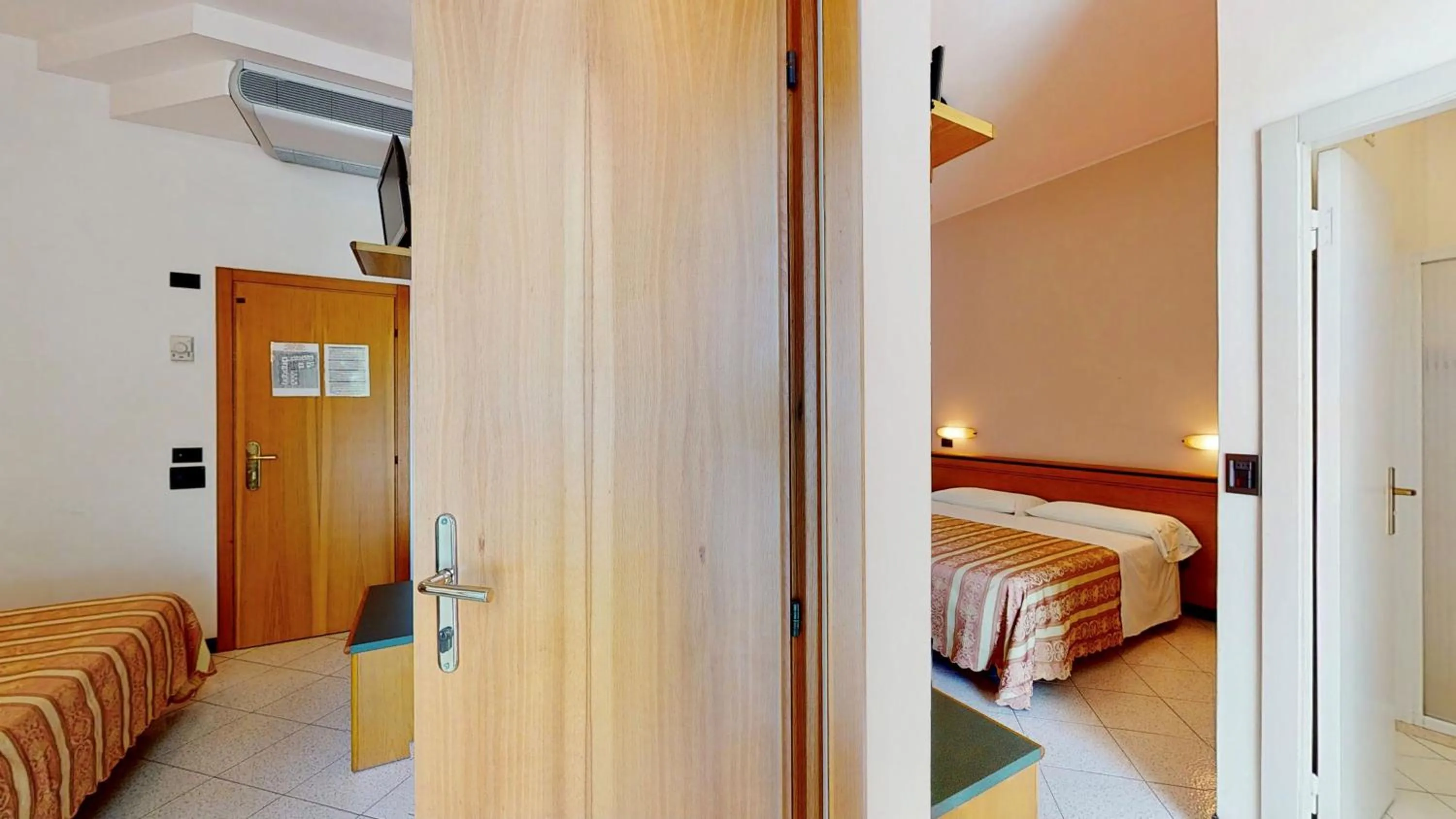 Bed in Hotel Excelsior