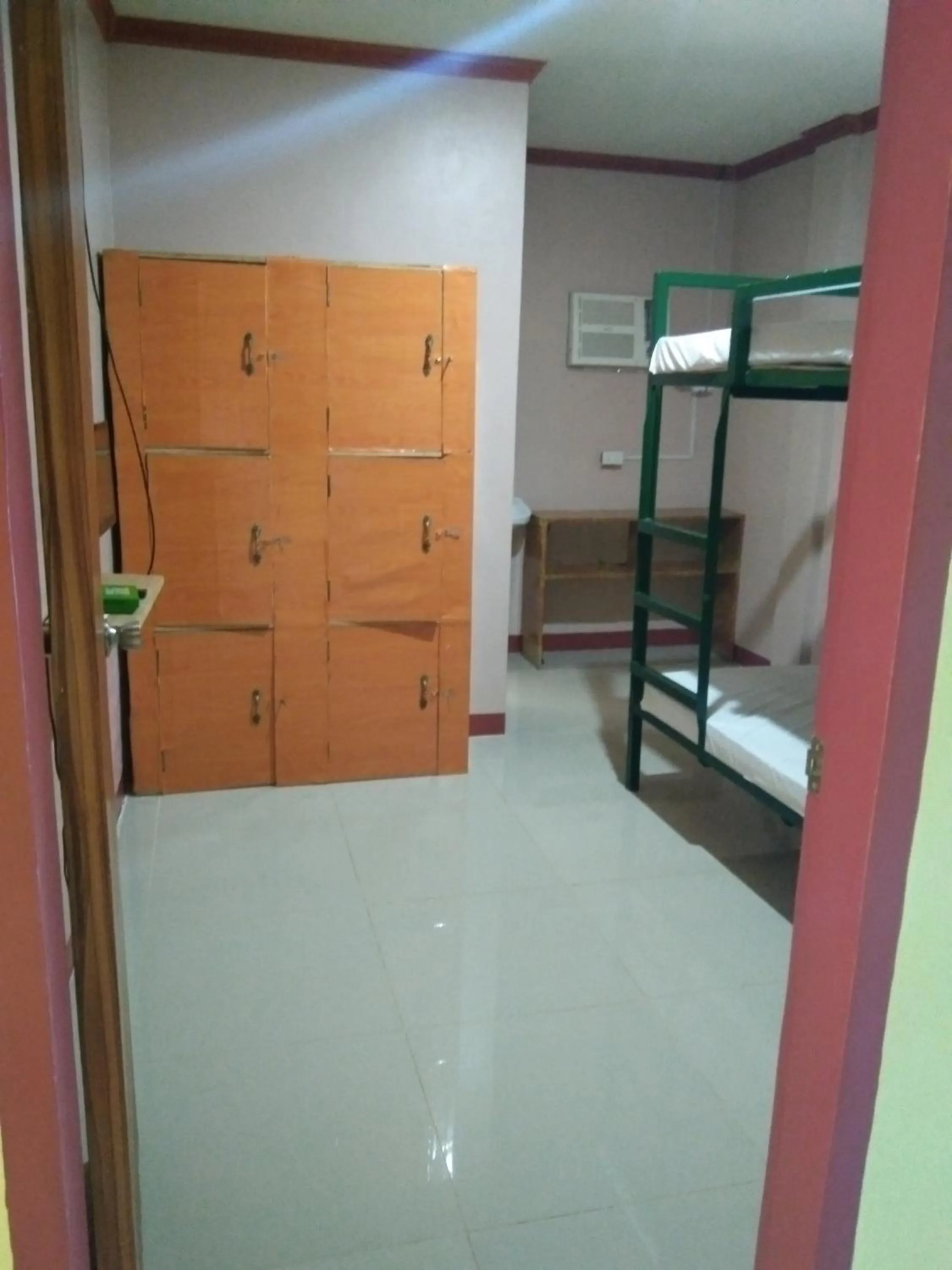 Bed in RMS Travellers Inn