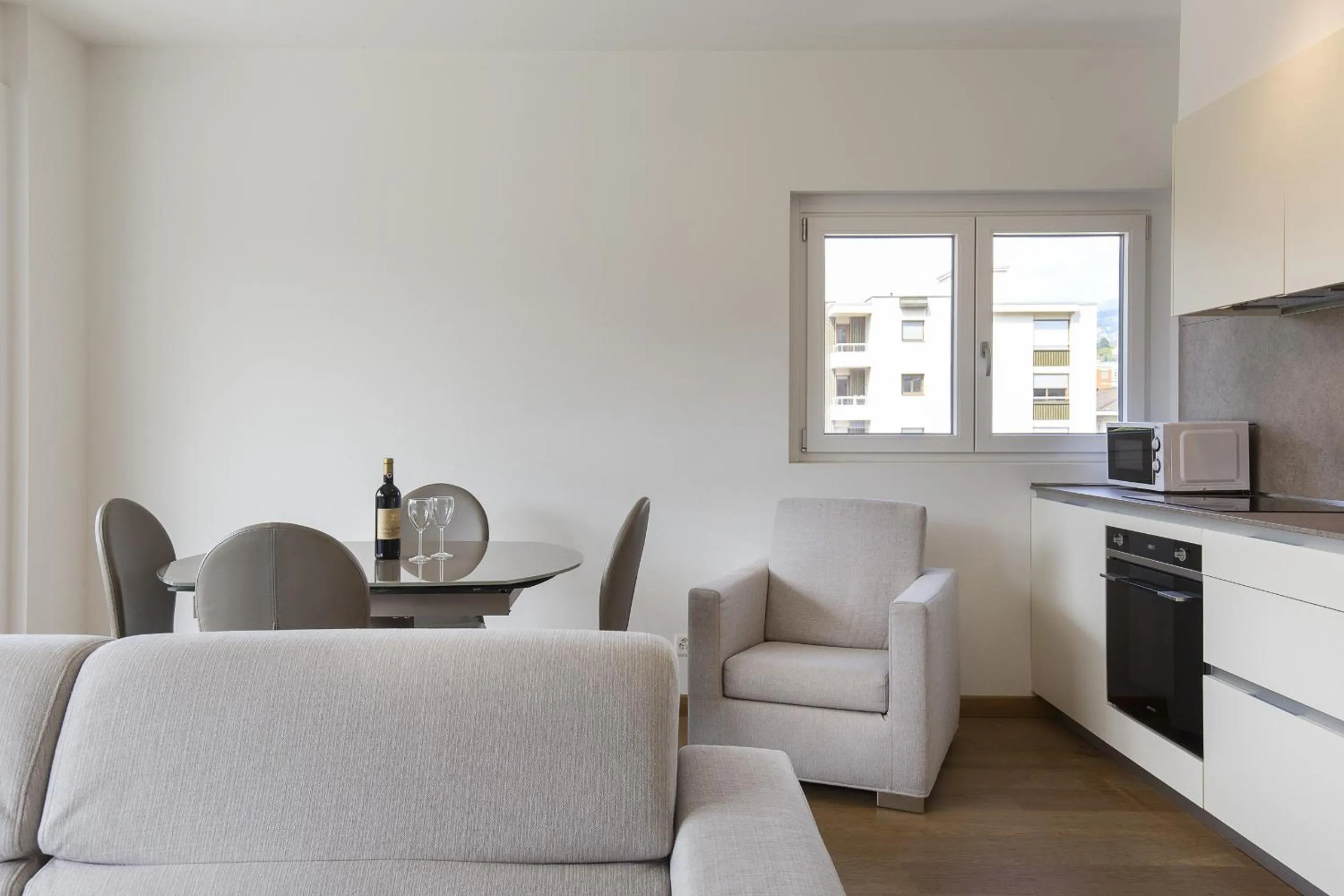 Kitchen or kitchenette in Roggia Apartments by Quokka 360 - central flats with parking space