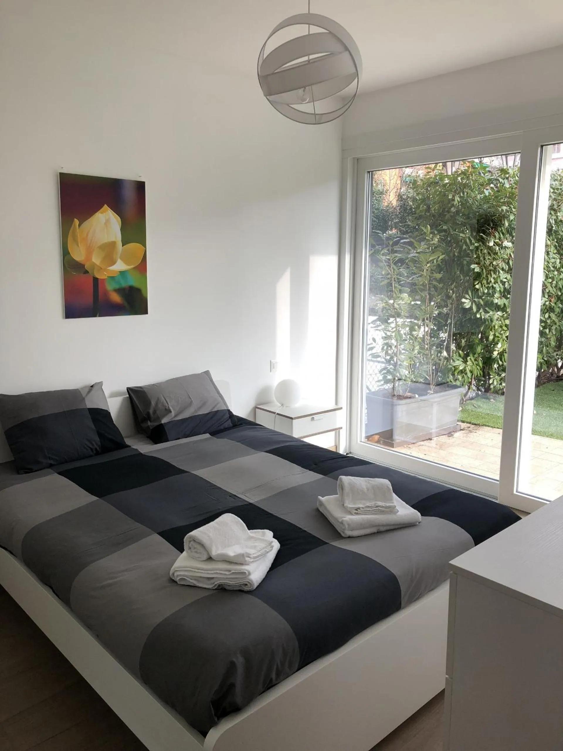Bedroom, Bed in Roggia Apartments by Quokka 360 - central flats with parking space