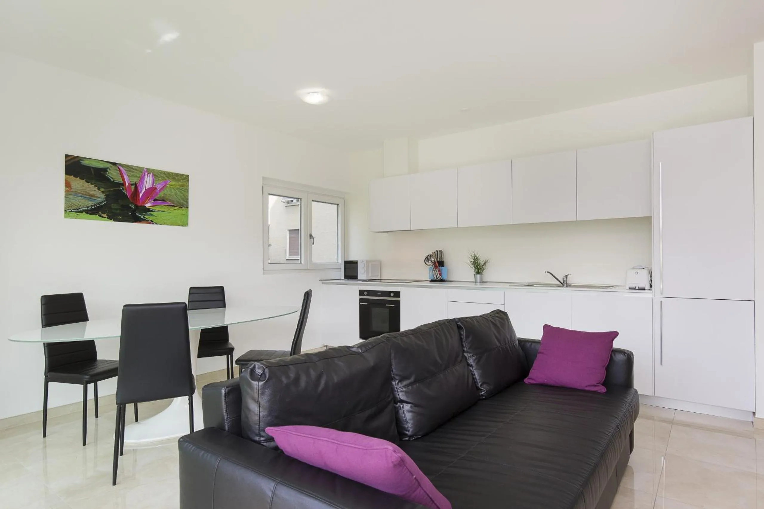 Kitchen or kitchenette in Roggia Apartments by Quokka 360 - central flats with parking space