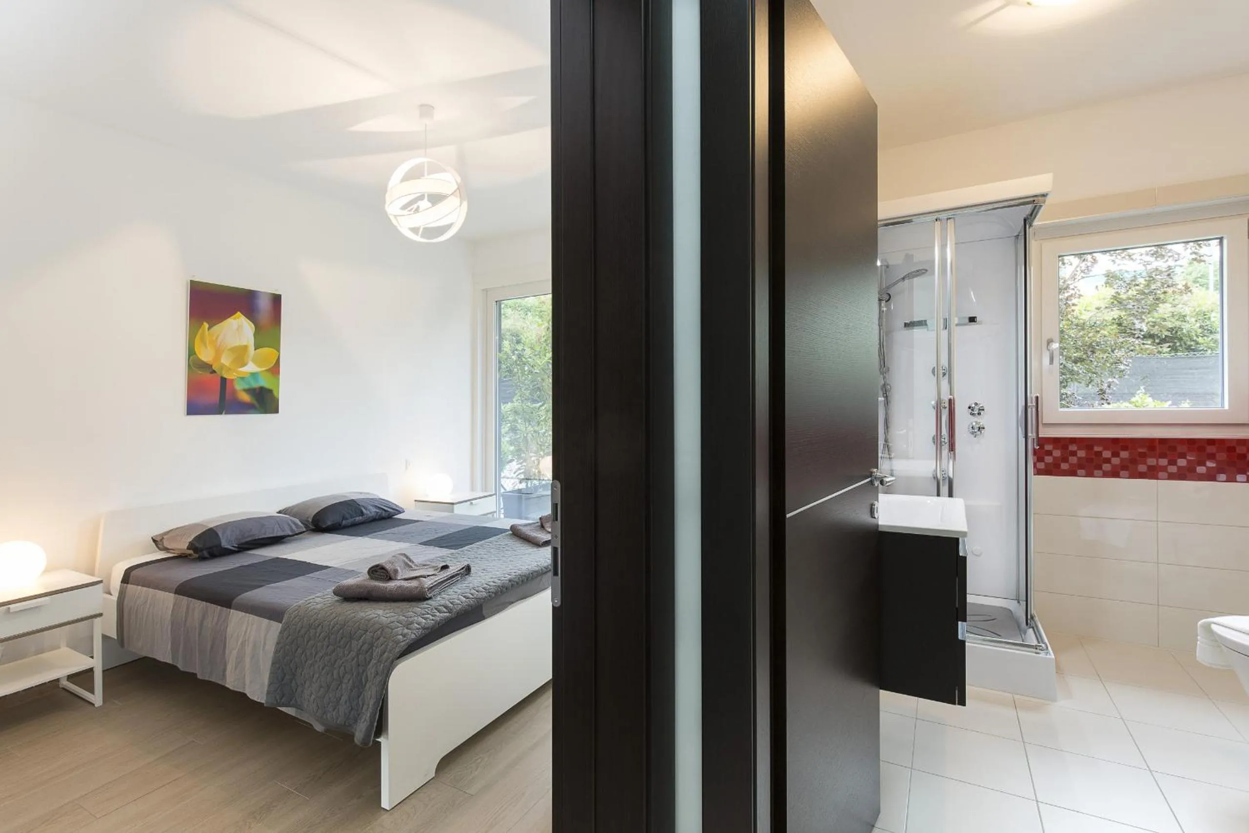 Decorative detail, Bed in Roggia Apartments by Quokka 360 - central flats with parking space
