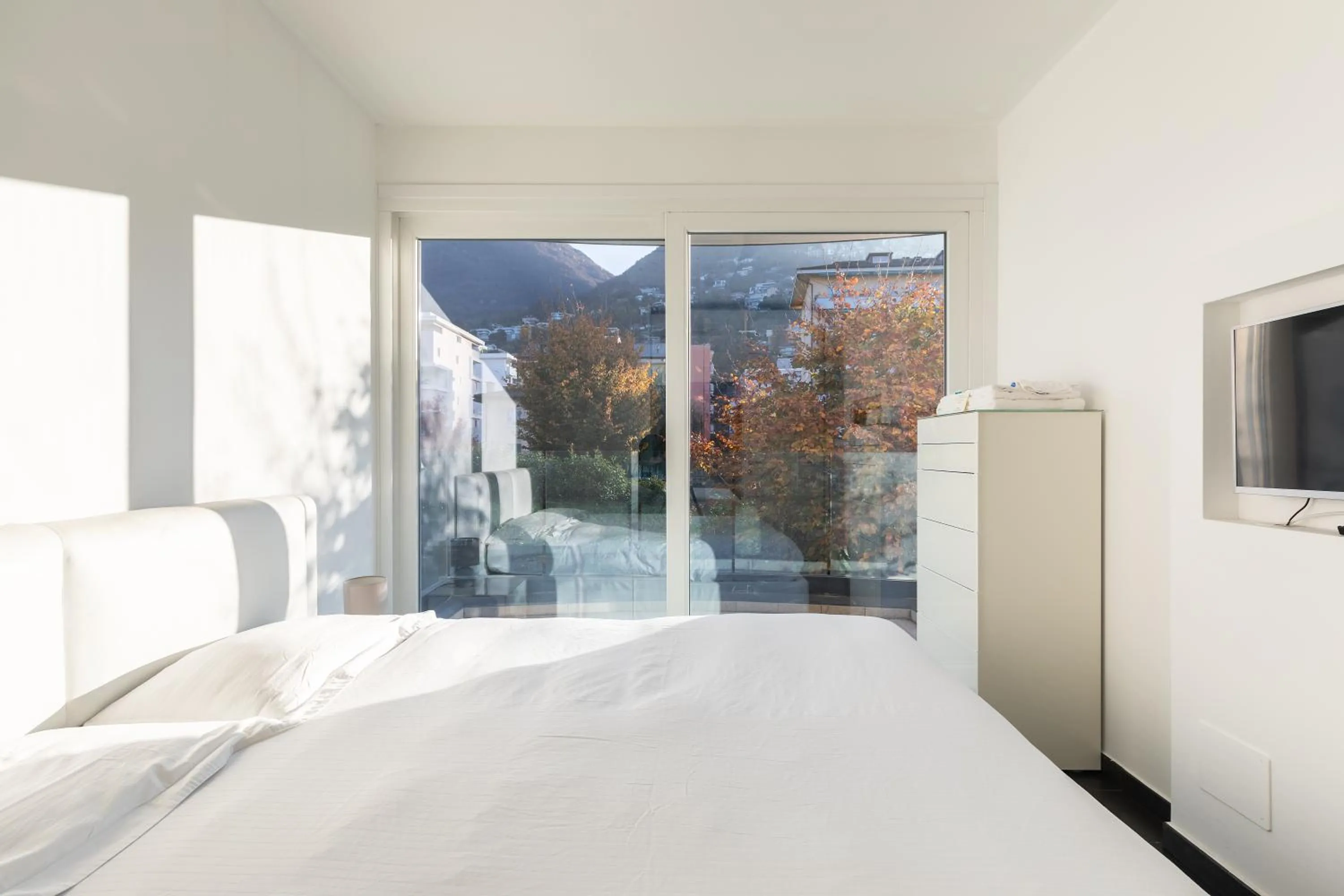 Bed in Roggia Apartments by Quokka 360 - central flats with parking space