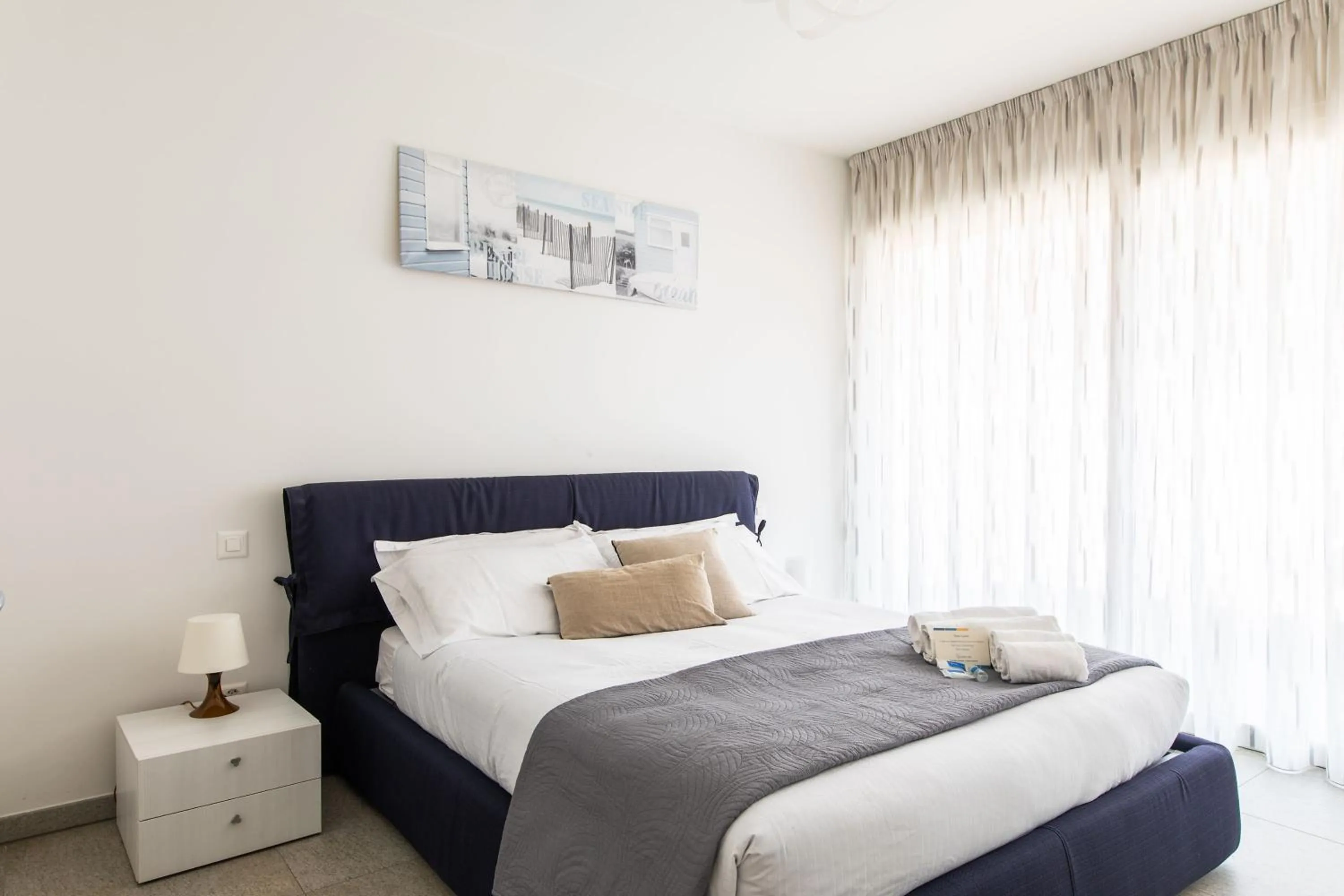 Bedroom, Bed in Roggia Apartments by Quokka 360 - central flats with parking space