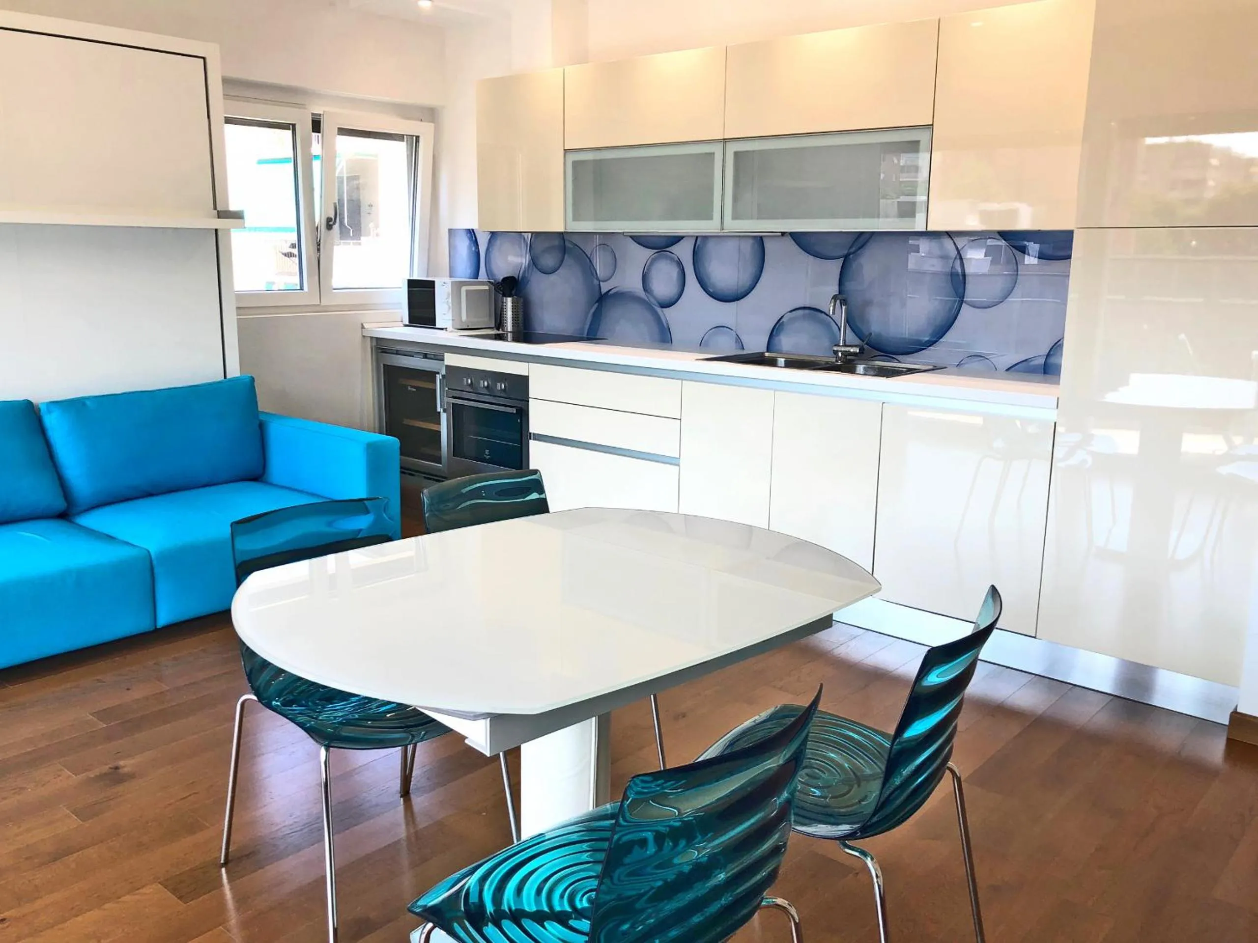 Kitchen or kitchenette in Roggia Apartments by Quokka 360 - central flats with parking space