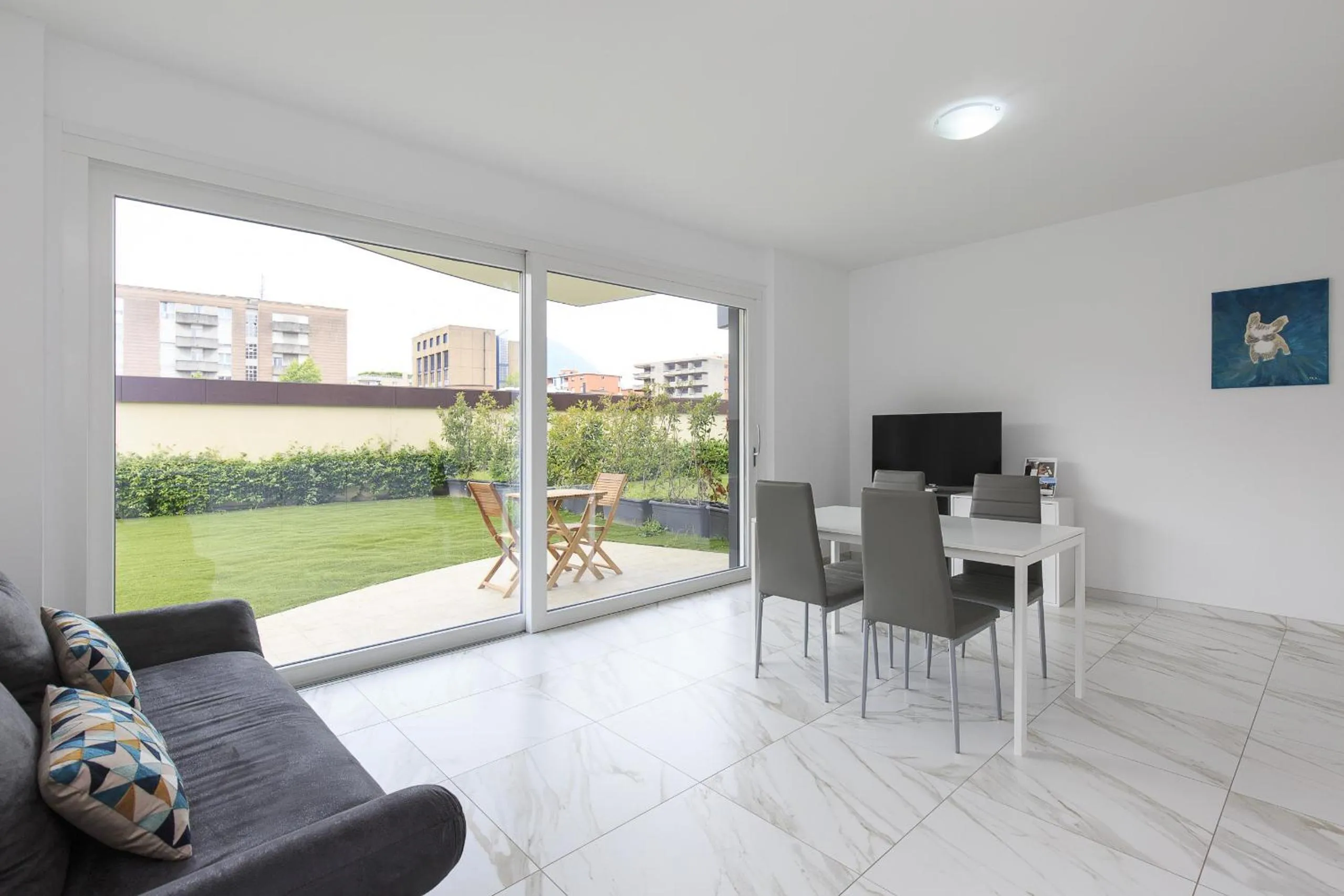 Living room in Roggia Apartments by Quokka 360 - central flats with parking space