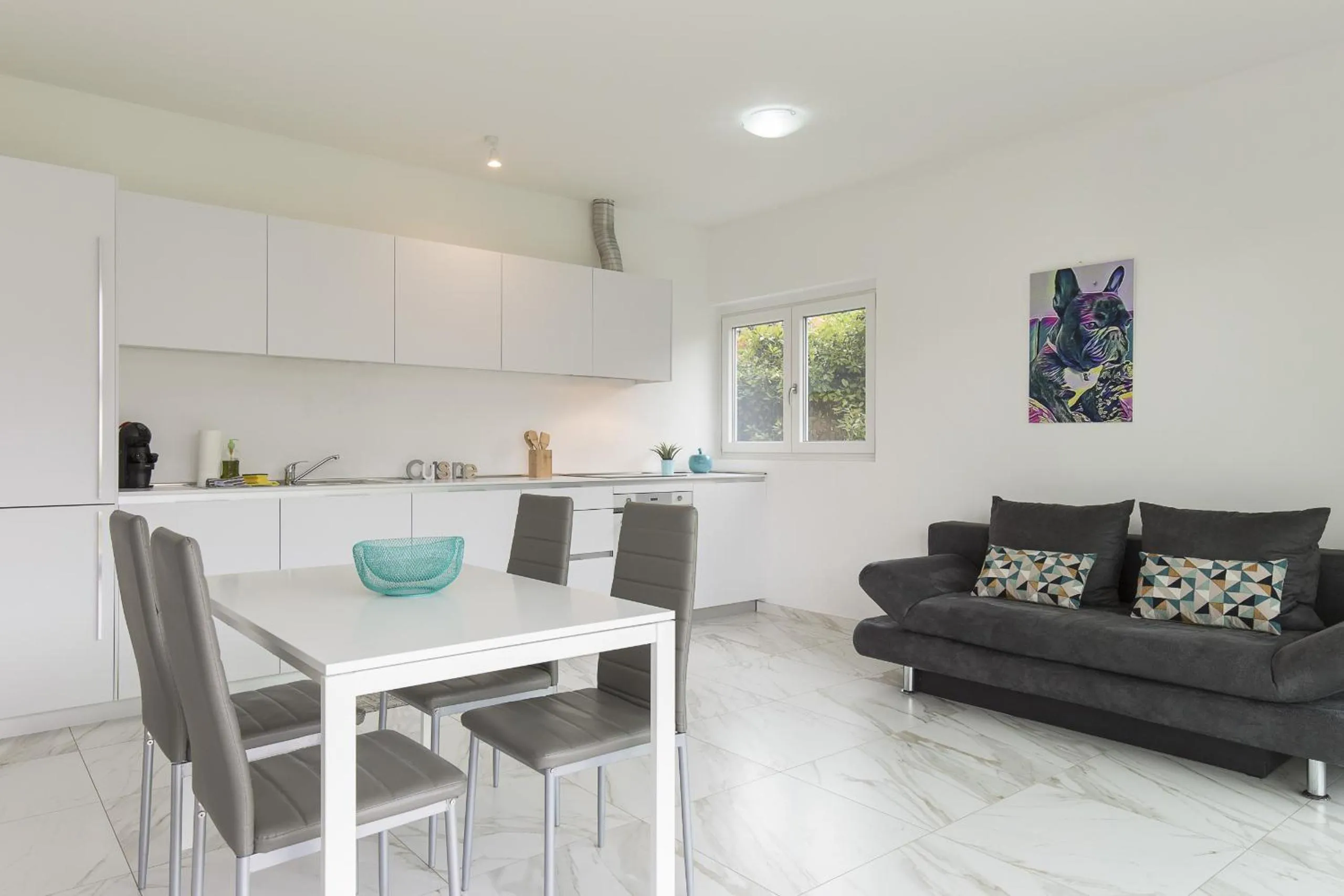 Kitchen or kitchenette in Roggia Apartments by Quokka 360 - central flats with parking space