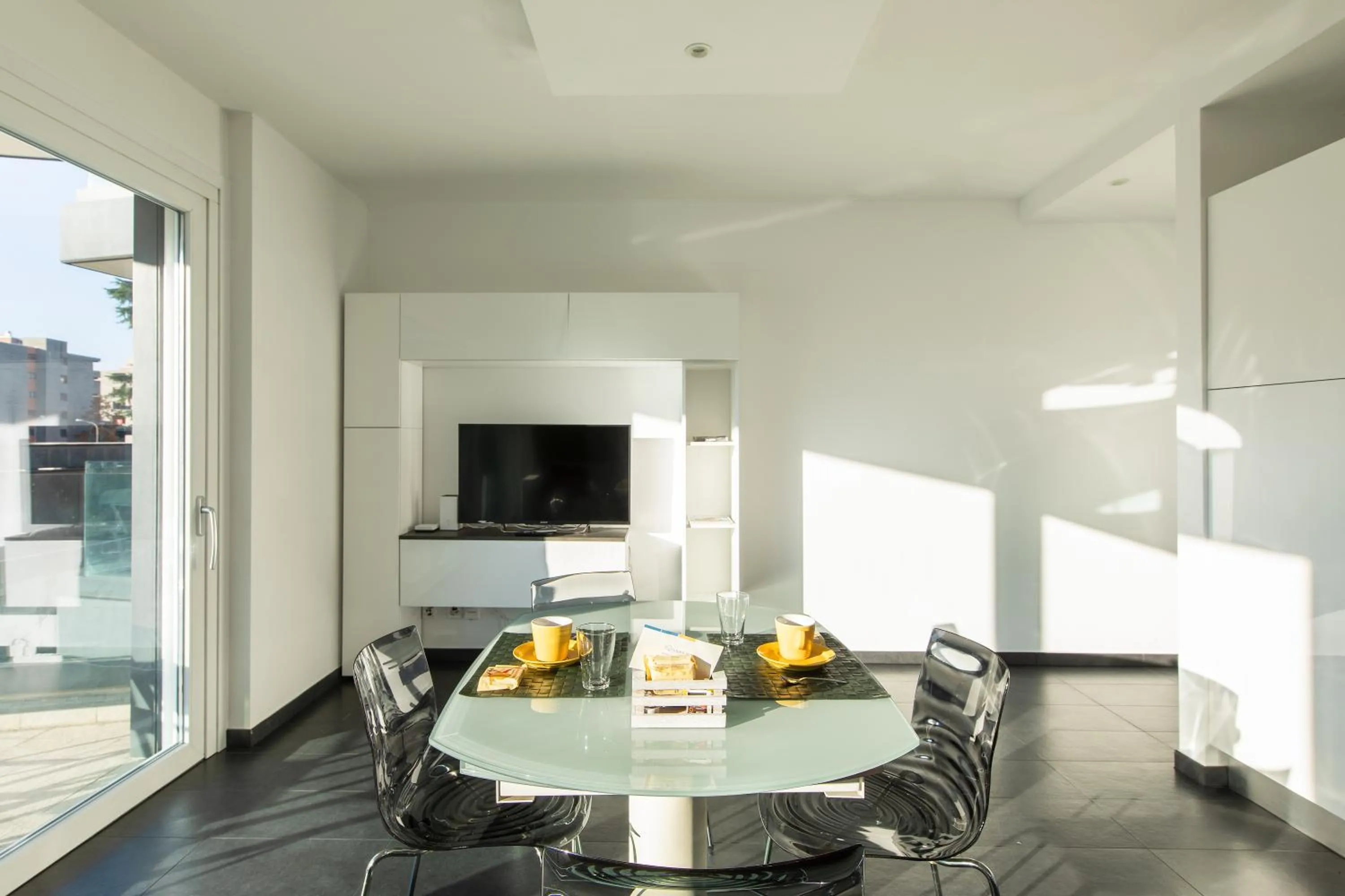 TV and multimedia in Roggia Apartments by Quokka 360 - central flats with parking space