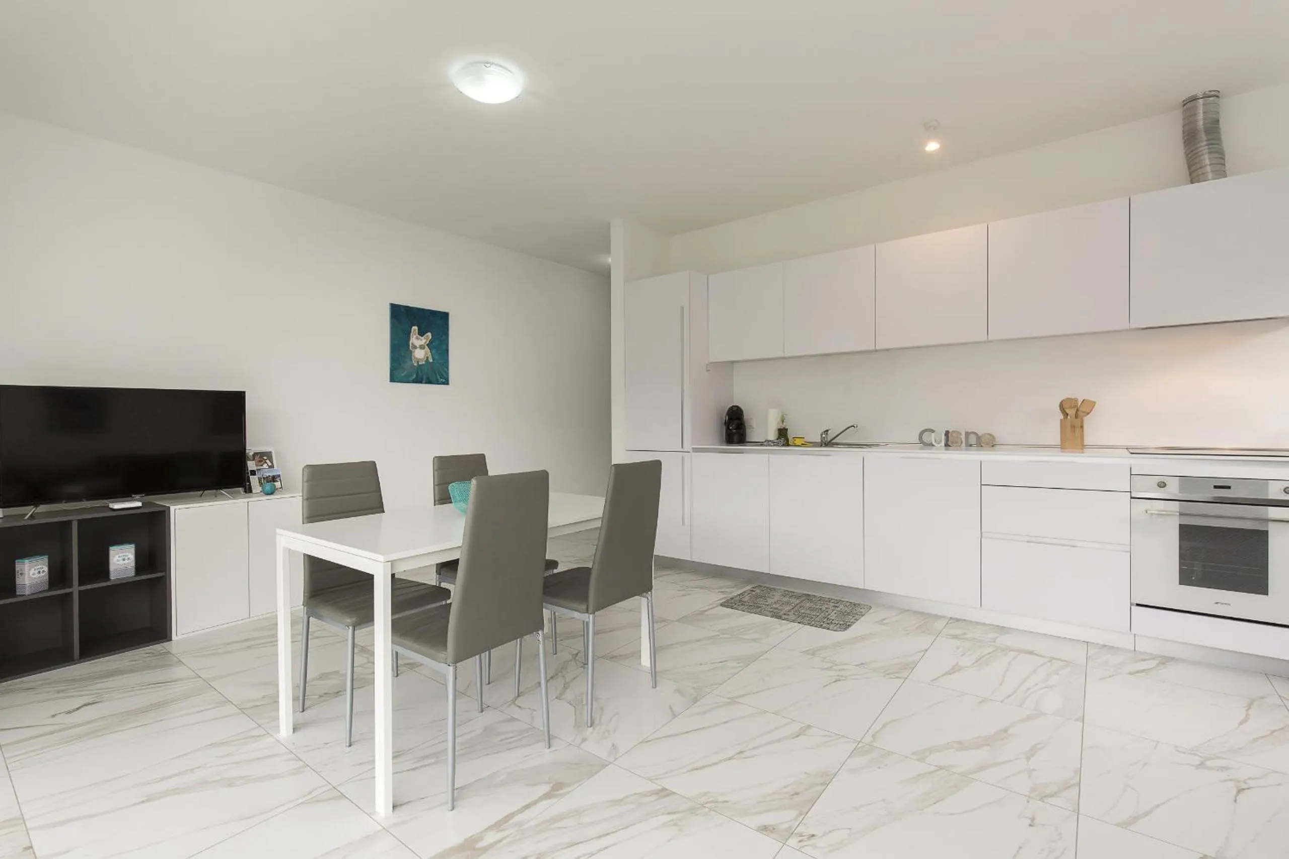 Kitchen or kitchenette in Roggia Apartments by Quokka 360 - central flats with parking space