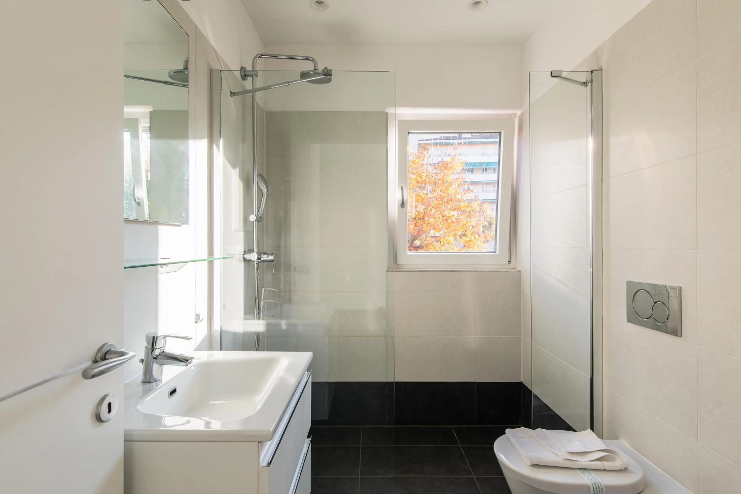 Shower in Roggia Apartments by Quokka 360 - central flats with parking space