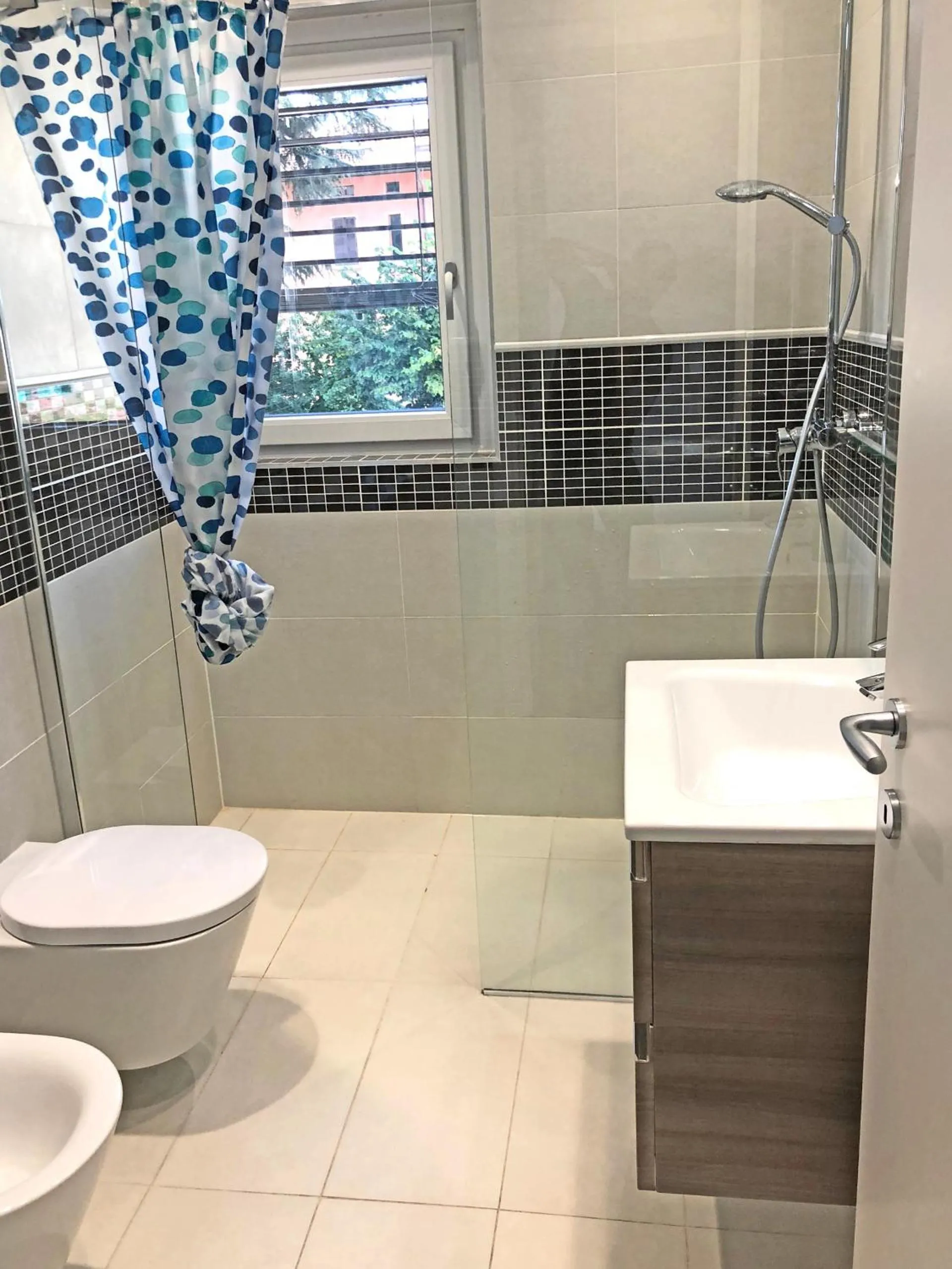 Shower in Roggia Apartments by Quokka 360 - central flats with parking space