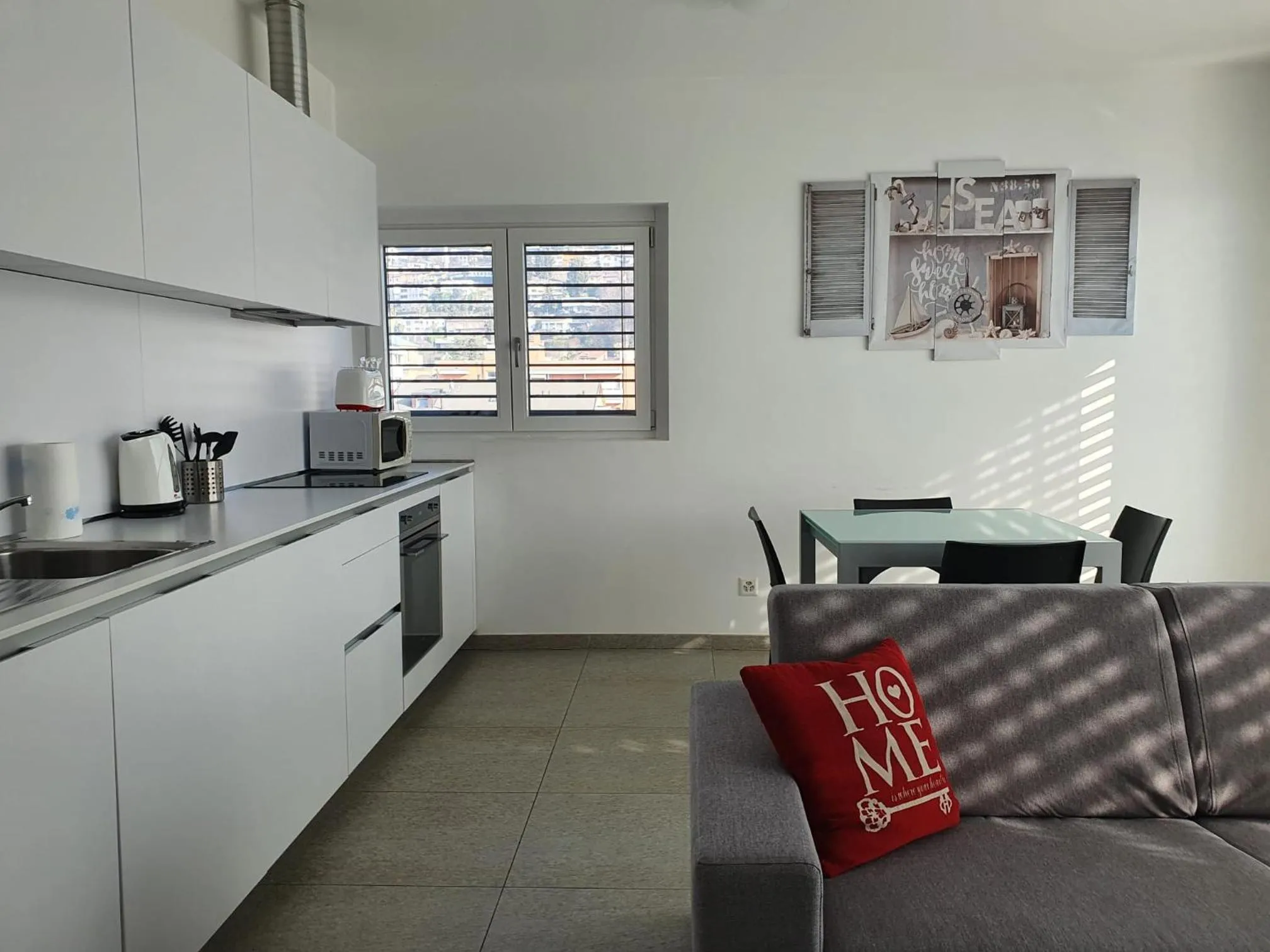 Living room in Roggia Apartments by Quokka 360 - central flats with parking space