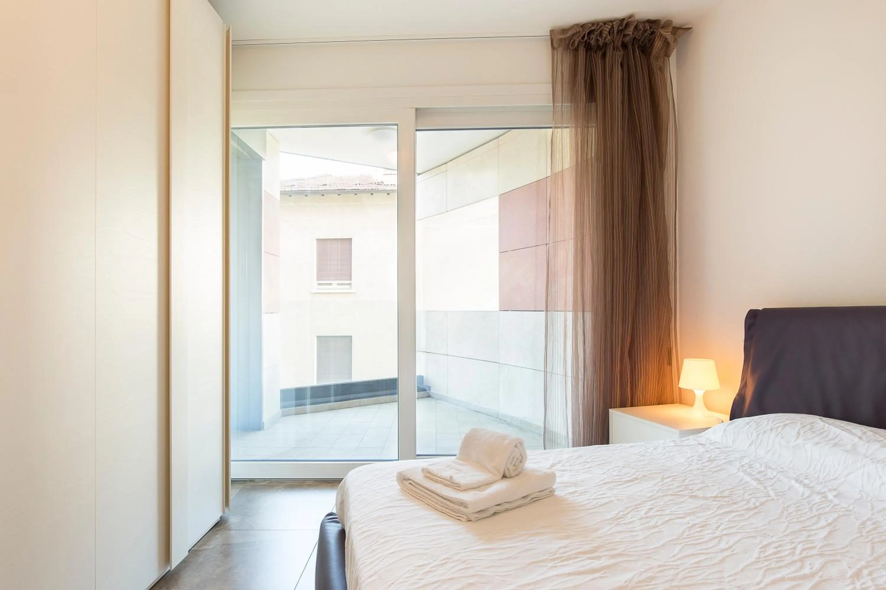 Bed in Roggia Apartments by Quokka 360 - central flats with parking space