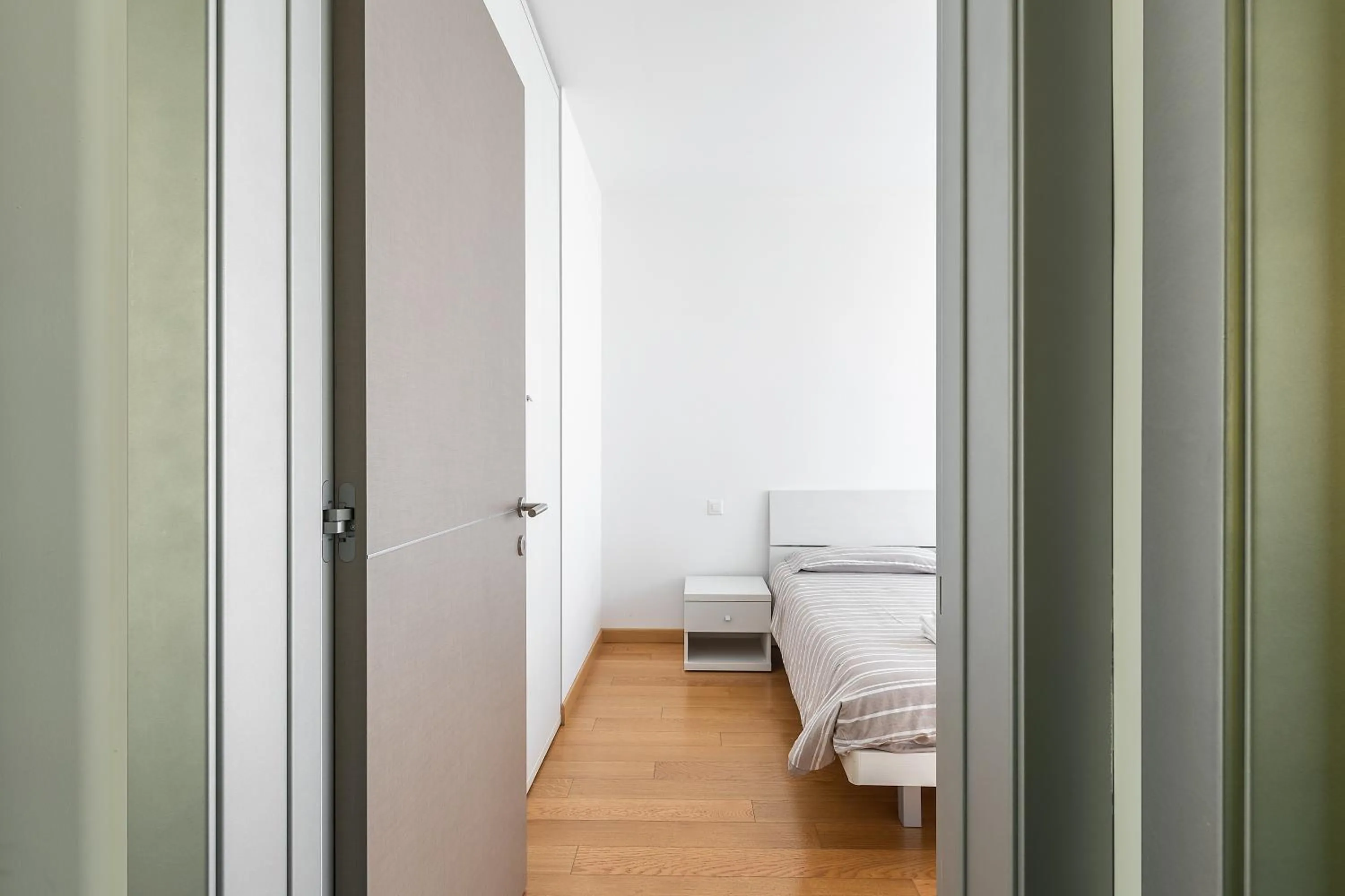 Bed in Roggia Apartments by Quokka 360 - central flats with parking space