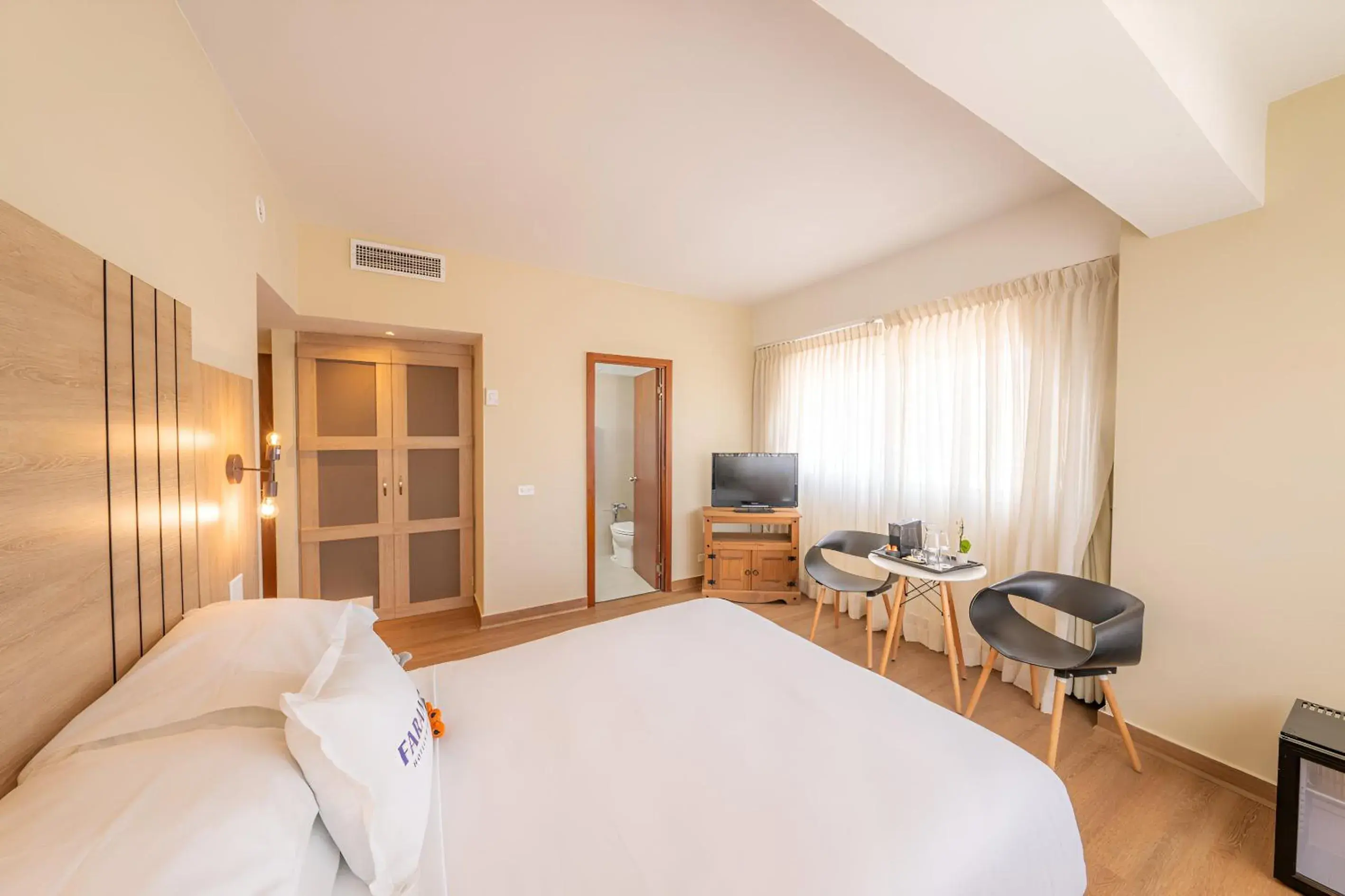 Bed in Hotel Faranda Express Soloy and Casino, a member of Radisson Individuals Bed in Hotel Faranda Express Soloy and Casino, a member of Radisson Individuals