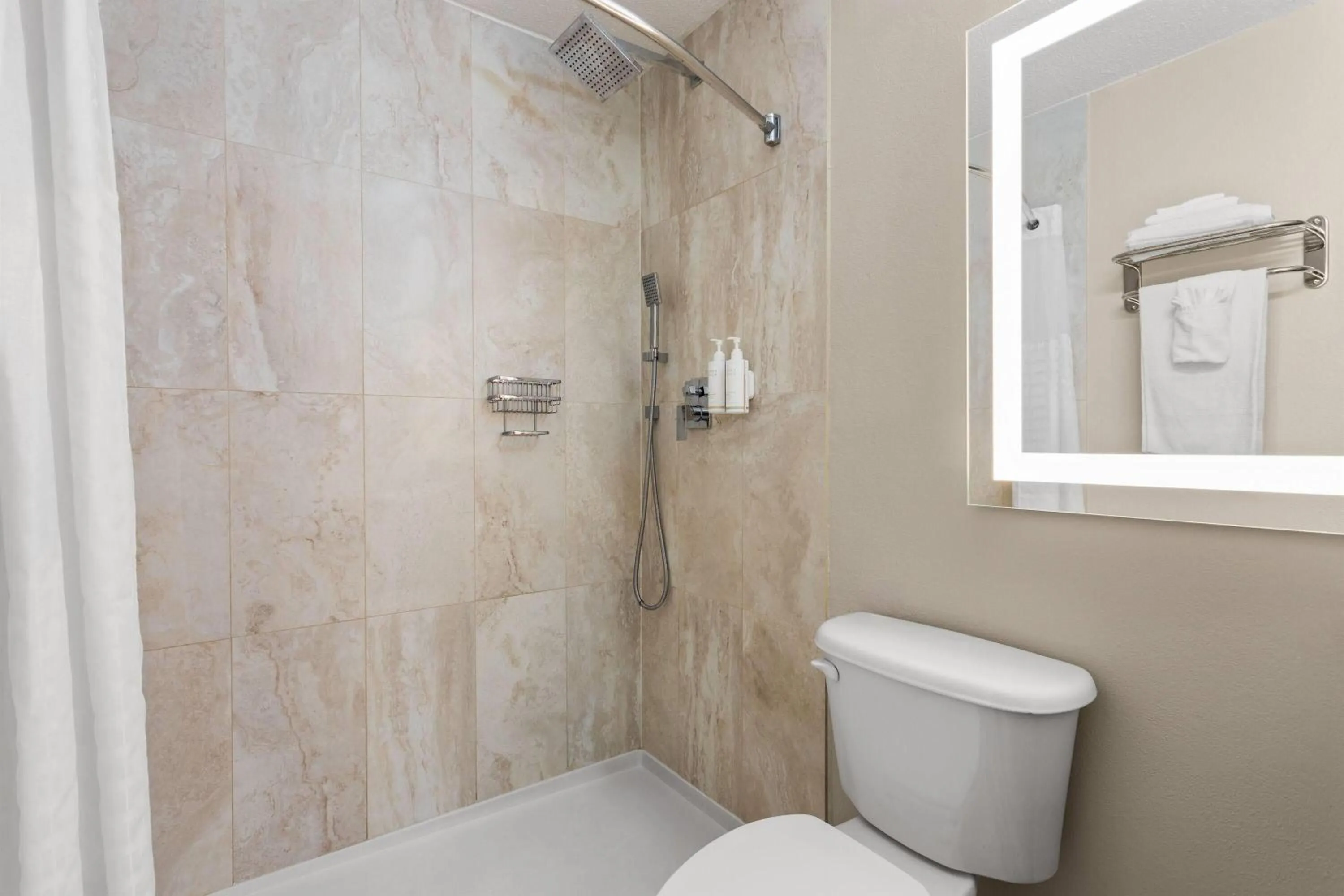 Bathroom in Days Inn and Suites by Wyndham Hammond, IN