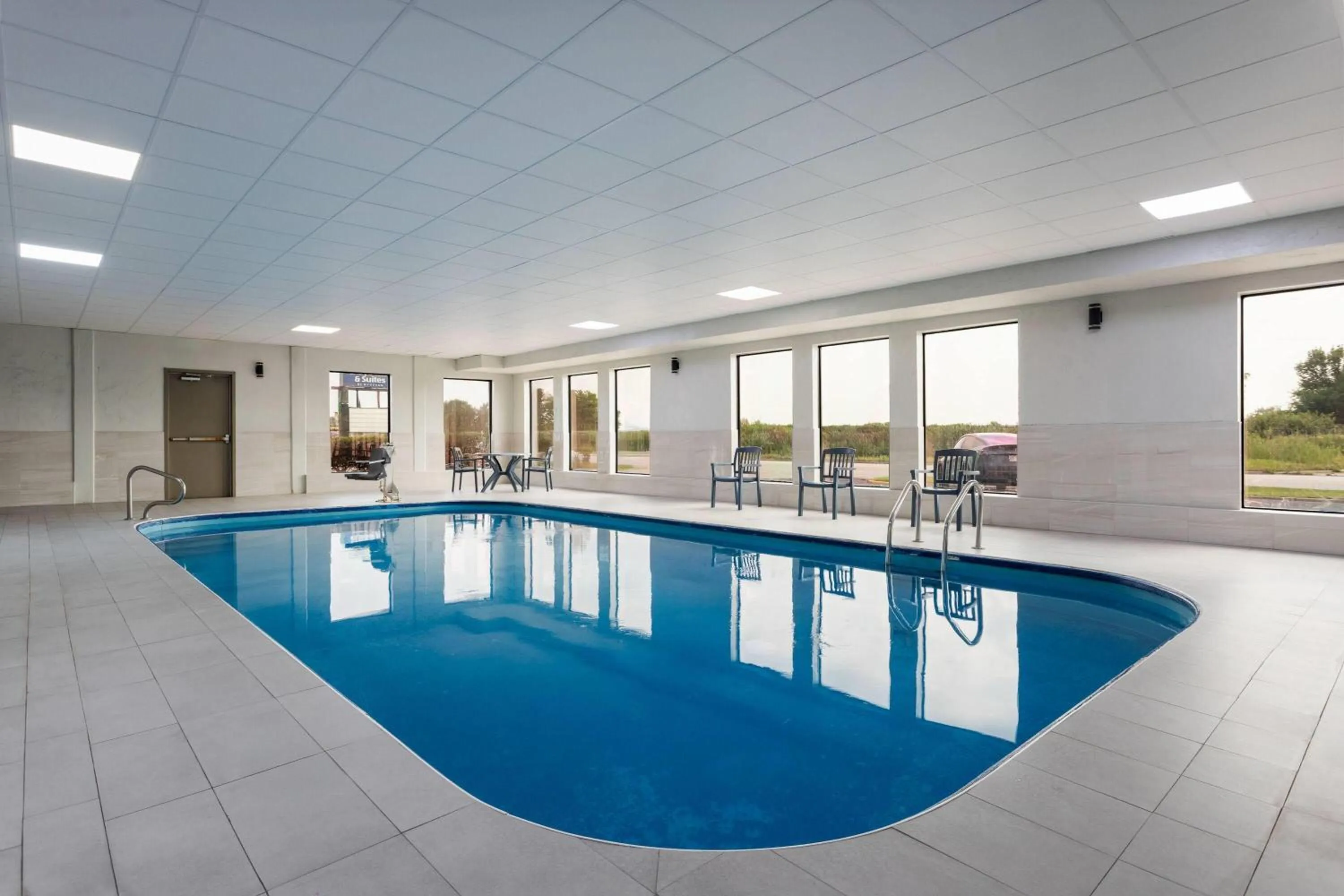 Swimming pool in Days Inn and Suites by Wyndham Hammond, IN